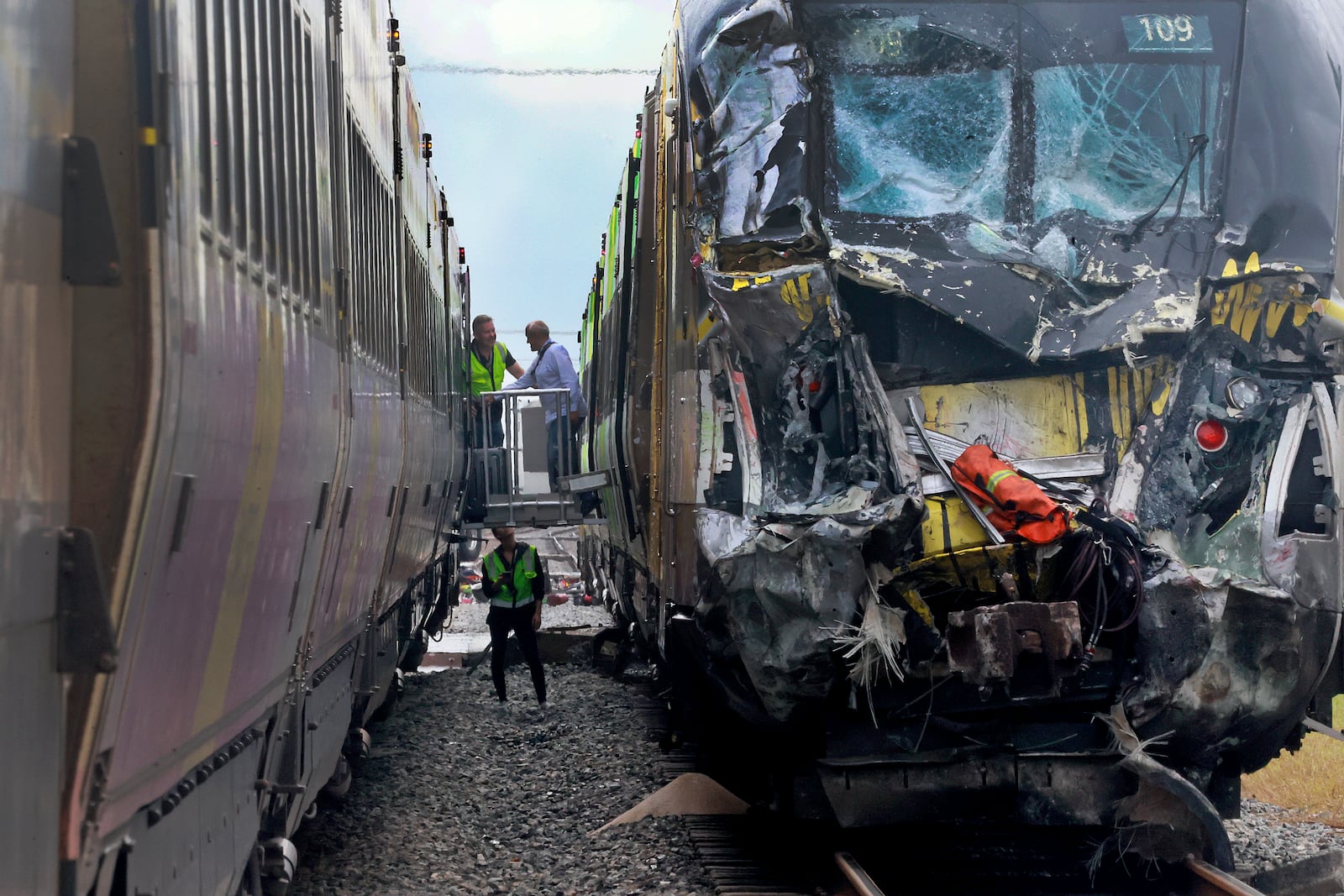 A damaged Brightline train is seen after it collided with a fire truck in downtown Delray Beach, Fla., Saturday, Dec. 28, 2024. (Mike Stocker/South Florida Sun-Sentinel via AP)