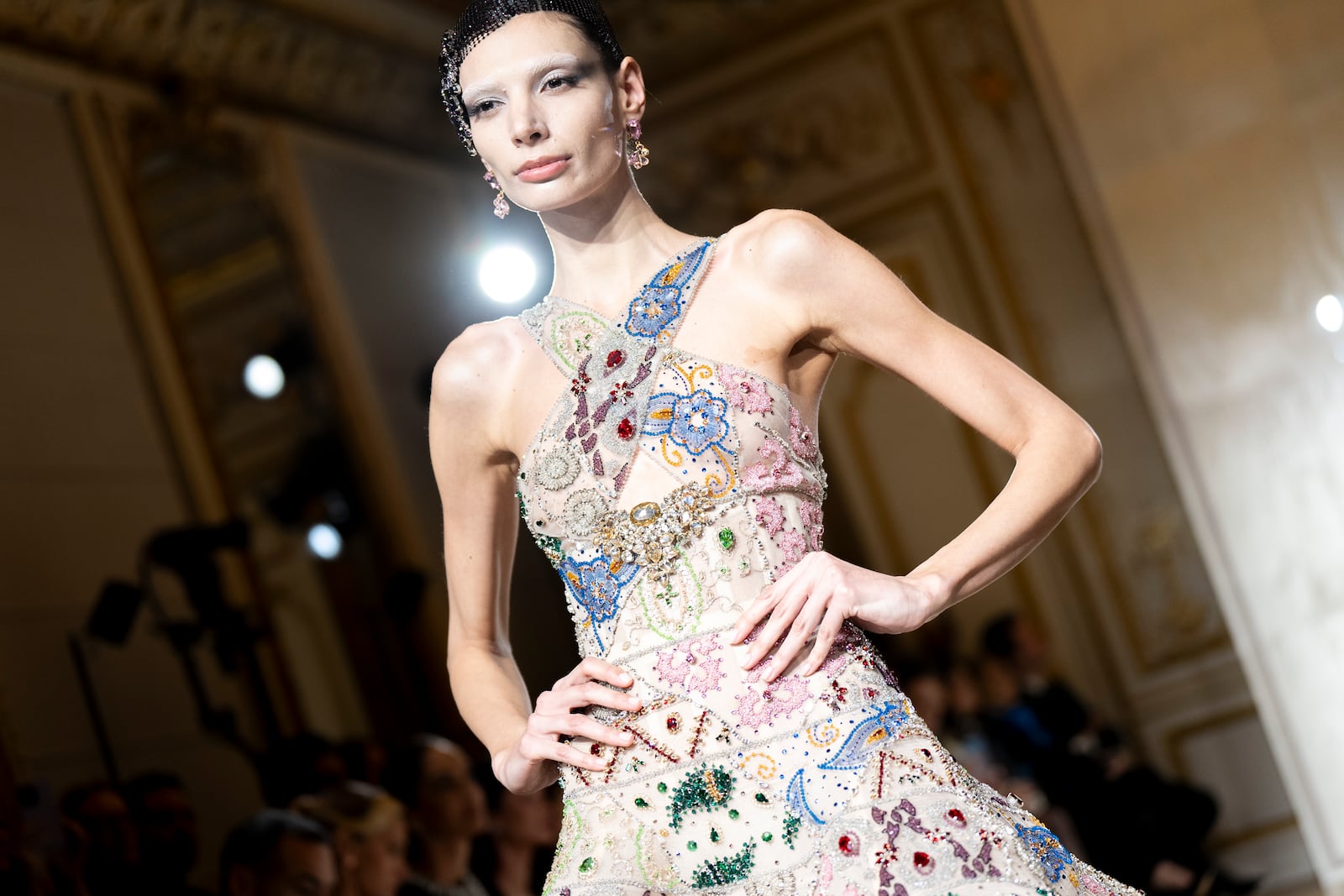 A model wears a creation as part of the Giorgio Armani Prive Haute Couture Spring Summer 2025 collection, that was presented in Paris, Tuesday, Jan. 28, 2025. (AP Photo/Lewis Joly).