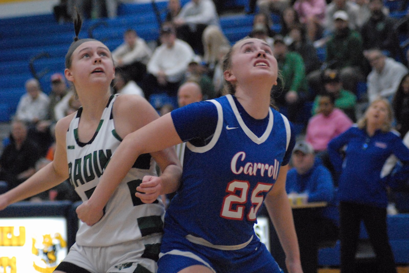 Carroll's Lyla Oliver (25) boxes out Badin's Ashley Pate on Tuesday at Springfield High School. Chris Vogt/CONTRIBUTED