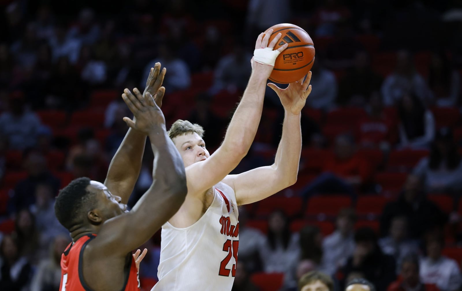 Miami University's Dan Luers drives to the basket during their basketball game against Ball State Friday, March 7, 2025 at Millett Hall in Oxford. Miami won 79-66. NICK GRAHAM/STAFF