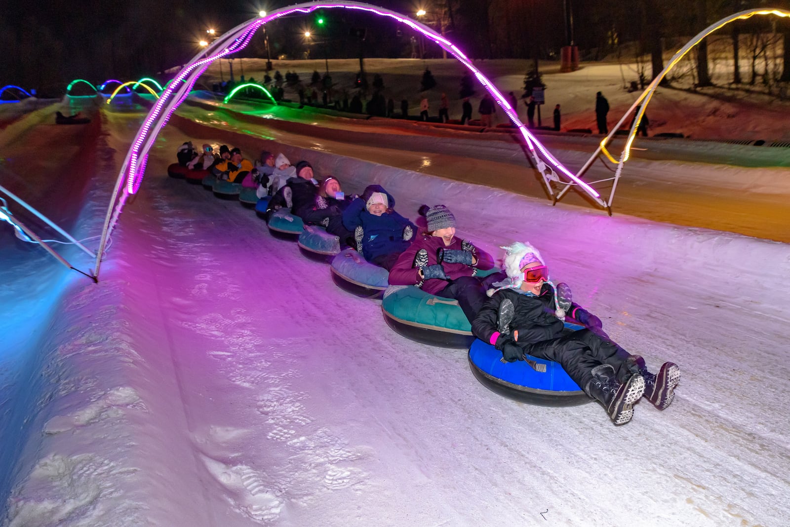 Guests participating in the glow tubing activity at Snow Trails in Mansfield.