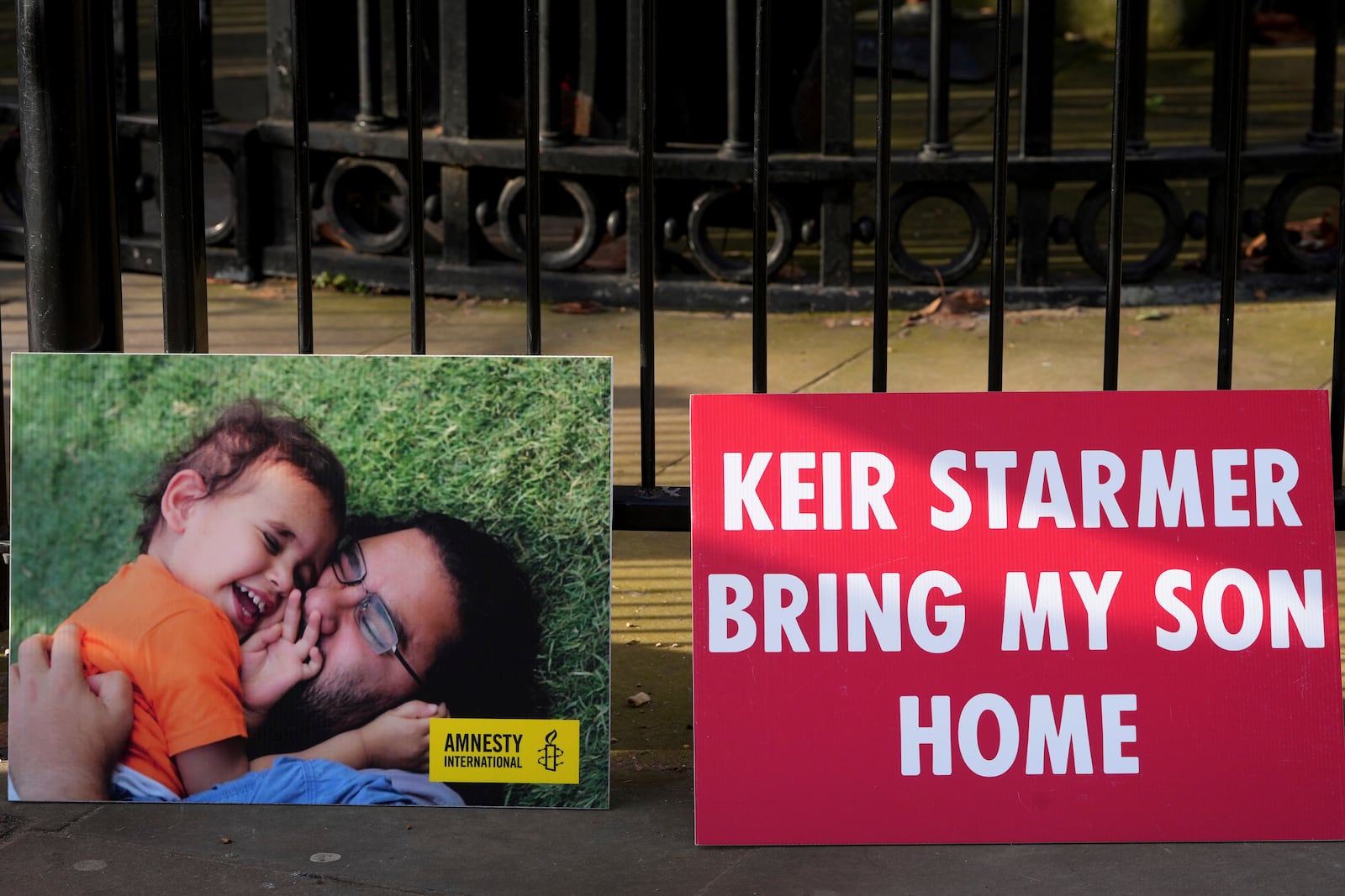 Banners placed by Leila Soueif, who has been on hunger strike for more than 129 days seeking the release of her son Alaa Abdel Fattah from prison in Egypt, outside Downing Street in London, Wednesday, Feb. 5, 2025. (AP Photo/Kirsty Wigglesworth)