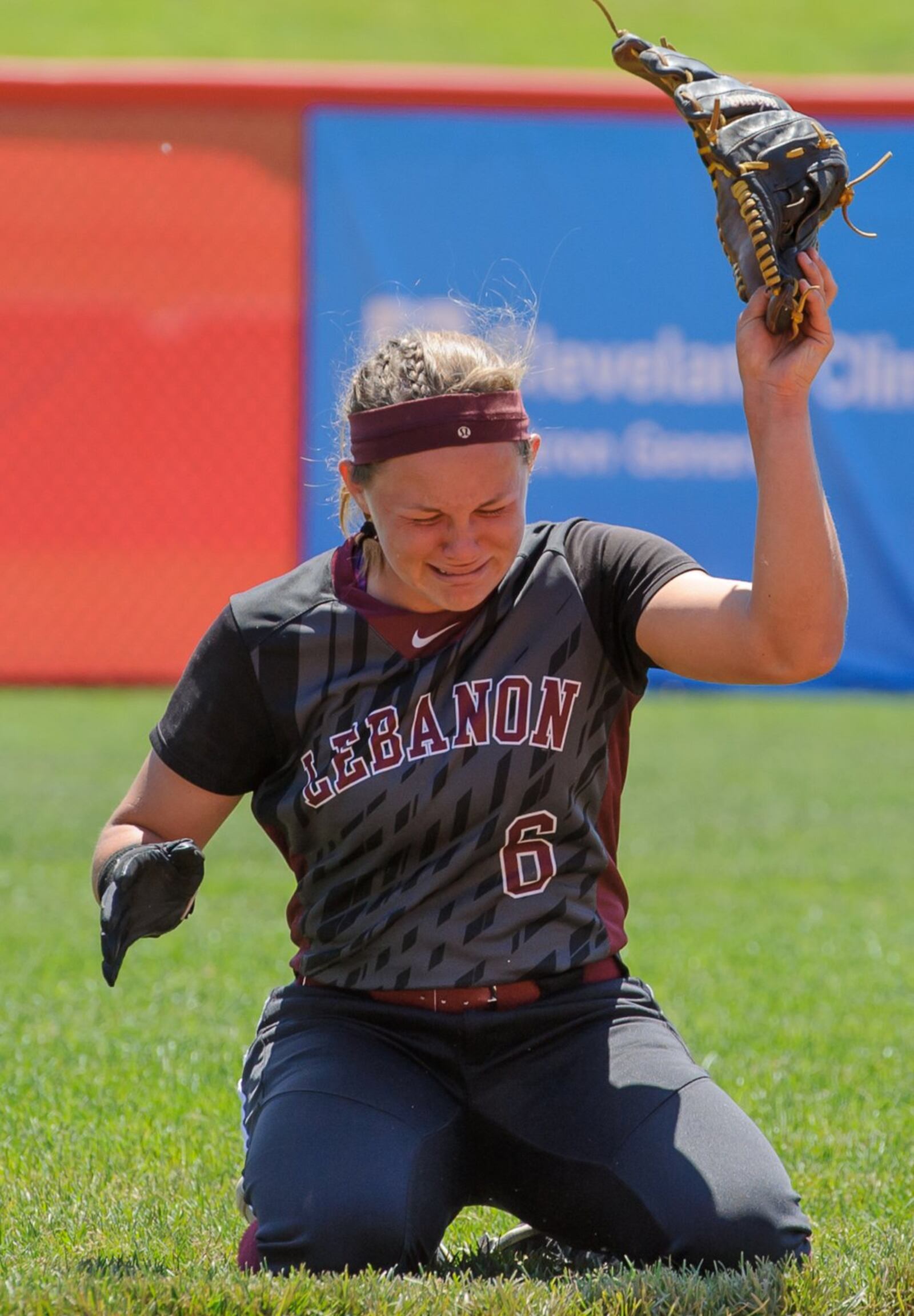 Lebanon left fielder Chloe Allen shows her frustration Saturday after watching Elyria score twice with two outs in the bottom of the seventh inning to win the Division I state championship at Firestone Stadium in Akron. CONTRIBUTED PHOTO BY BRYANT BILLING