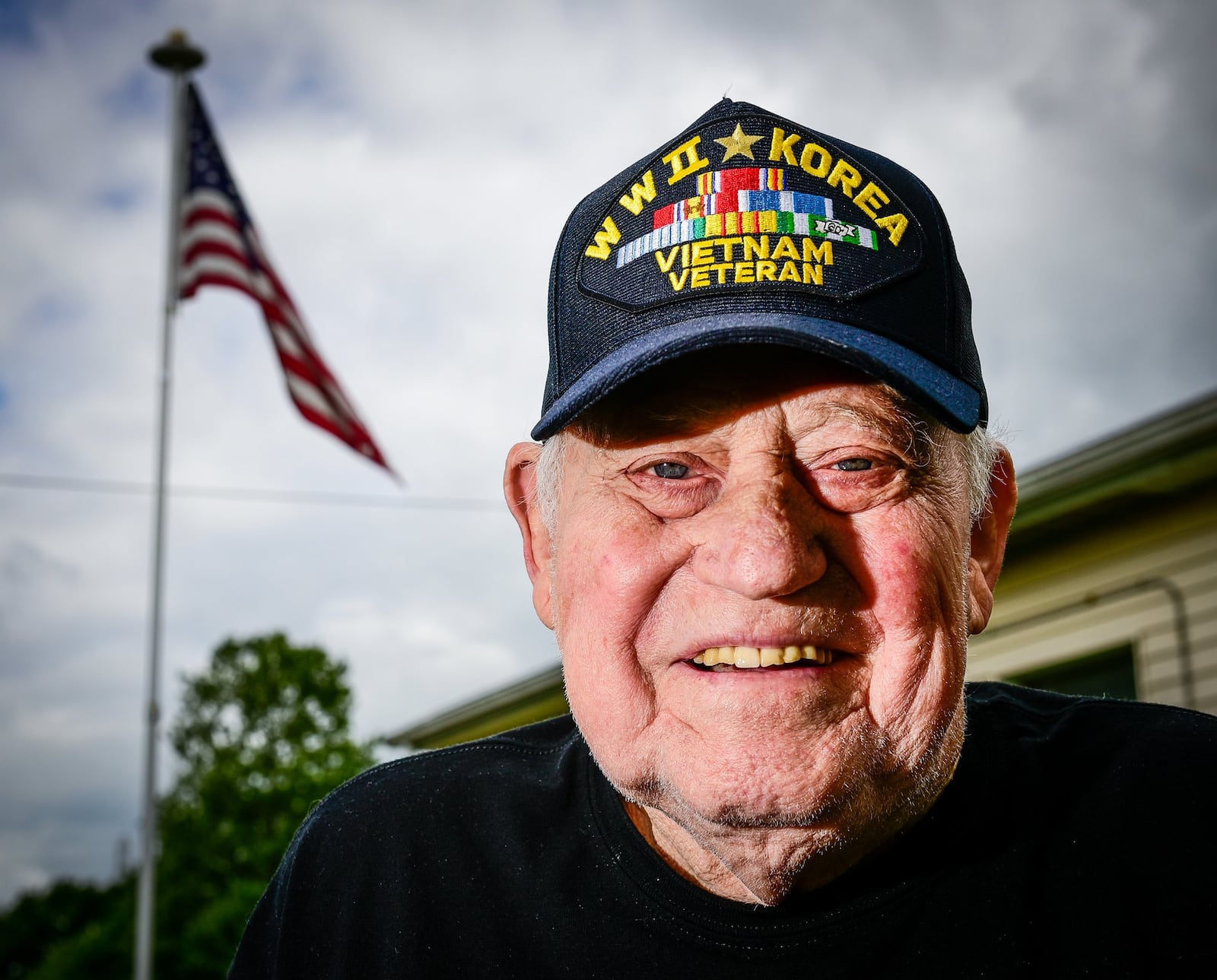 Cecil Daily, 89, proudly wears a black baseball hat embroidered with “WWII, Korean, Vietnam Veteran.” When asked about the hat, he says: “You can’t buy this thing.” 