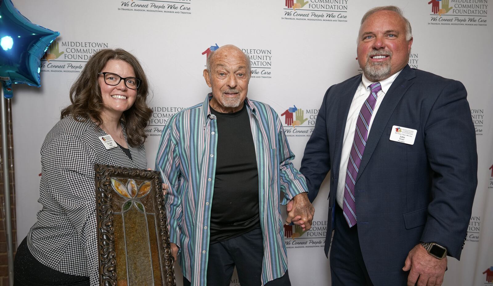 Richard Isroff, center, received the Roland P. Ely Jr. President’s Award during the Middletown Community Foundation annual awards dinner. On the left is, Sarah Nathan, executive director of the MCF, and on the right is John Kiser, past board president. SUBMITTED PHOTO