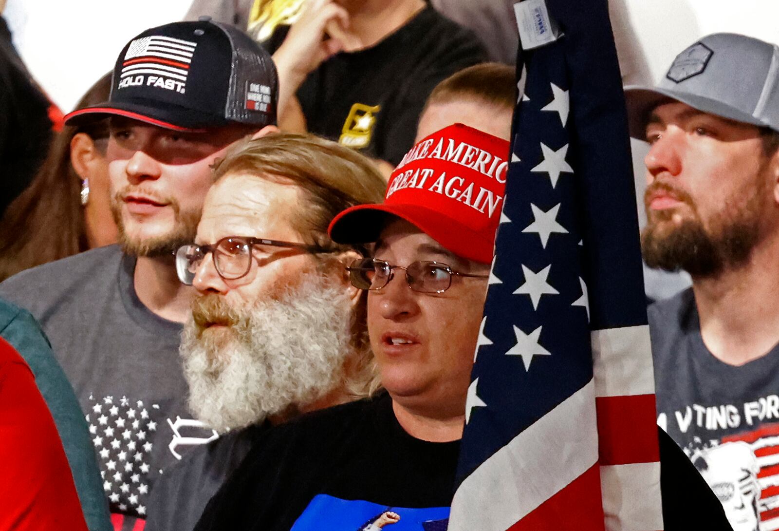 Members of the crowd listen to former presidential candidate Vivek Ramaswamy during a town hall meeting at the Bushnell Banquet Center in Springfield Thursday, Sept. 19, 2024. BILL LACKEY/STAFF