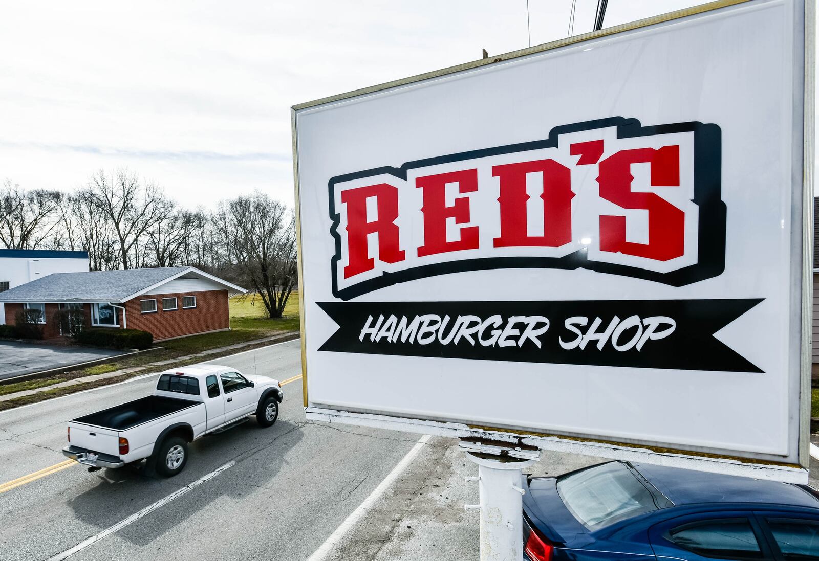 Red's Hamburger Shop at 103 S. Riverside Drive in New Miami reopened in February under new owners Craig and Yolanda Beuerlein. NICK GRAHAM / STAFF