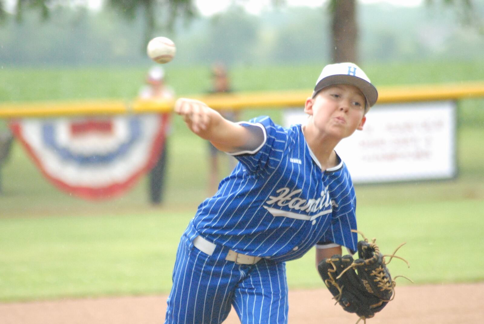 Hamilton West Side's Cole Vowell sends a pitch to the plate against Fairborn during the first round of the Ohio Little League state tournament on Saturday at Englewood's Centennial Park. West Side won 17-0 in four innings. Chris Vogt/CONTRIBUTED