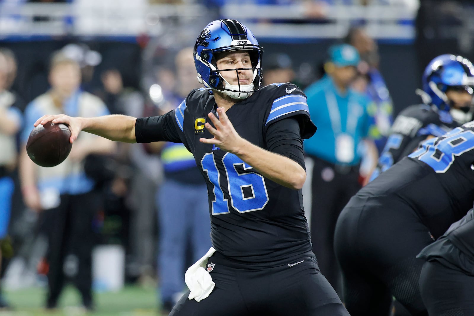 Detroit Lions quarterback Jared Goff (16) passes against the Buffalo Bills during the first half of an NFL football game, Sunday, Dec. 15, 2024, in Detroit. (AP Photo/Duane Burleson)