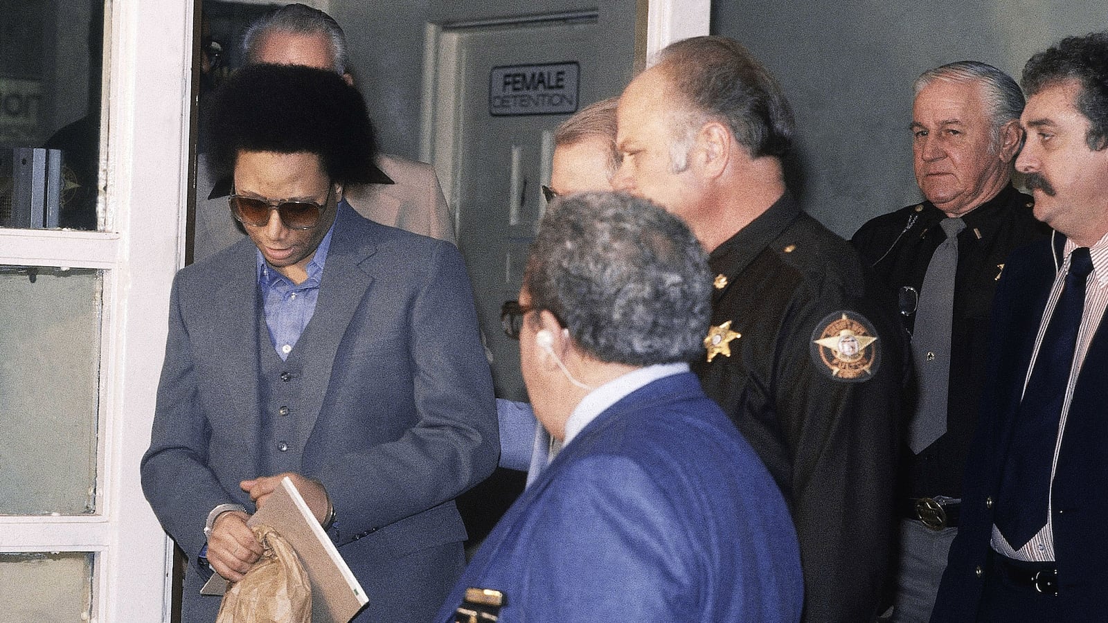 Convicted killer Wayne Williams is pictured leaving court during one of his pre-trial proceedings in 1992. Williams, now 60, is serving life in prison in the murders of Nathaniel Cater, 27, and Jimmy Ray Payne, 21, who were among about 29 black men and boys slain in the Atlanta area during a 23-month killing period from 1979 to 1981. The series of killings, the majority of which were of children, became known as the Atlanta child murders. Williams was never convicted of any of the children’s slayings.