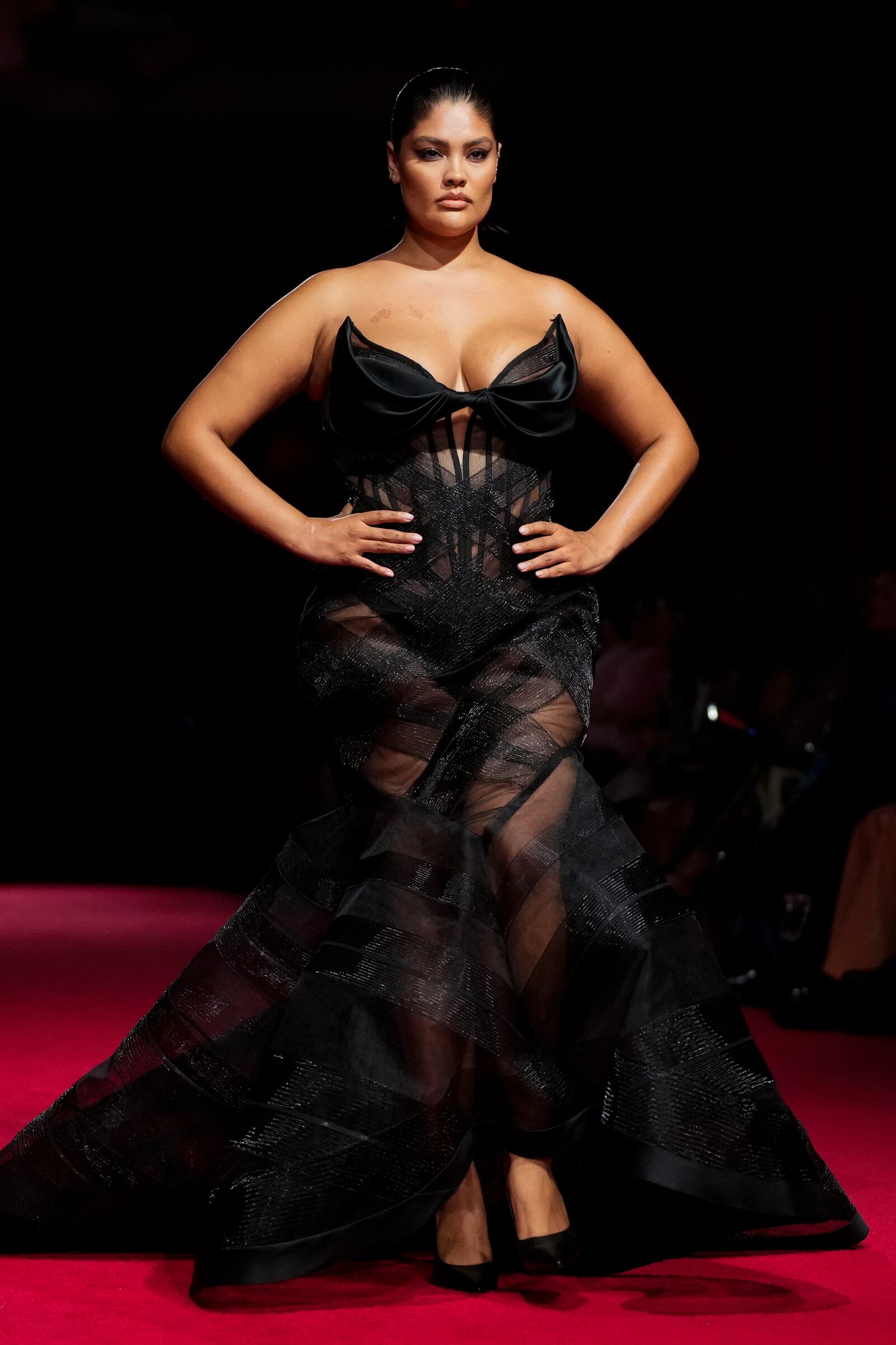 A model walks the runway during the Christian Siriano Fall/Winter 2025 fashion show at Chelsea Industrial during New York Fashion Week on Thursday, Feb. 6, 2025, in New York. (Photo by Charles Sykes/Invision/AP)