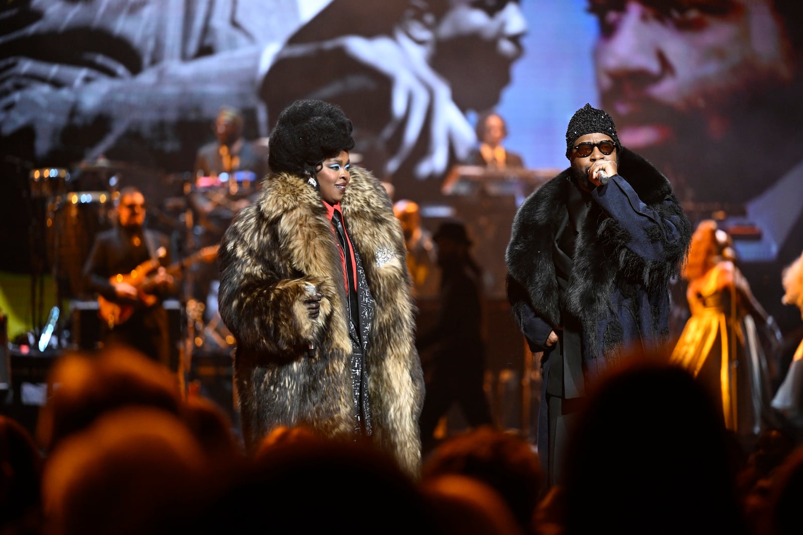 This image released by Peacock shows Ms. Lauryn Hill, left, and Wyclef Jean performing during "SNL50: The Homecoming Concert" on Friday, Feb. 14, 2025, in New York. (Todd Owyoung/Peacock via AP)