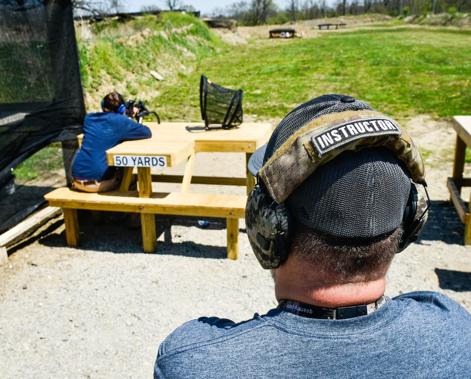 Doug Cavin, range manager at Lake Bailee Recreational Park and Gun Range in St. Clair Twp., oversees a shooting range session. 