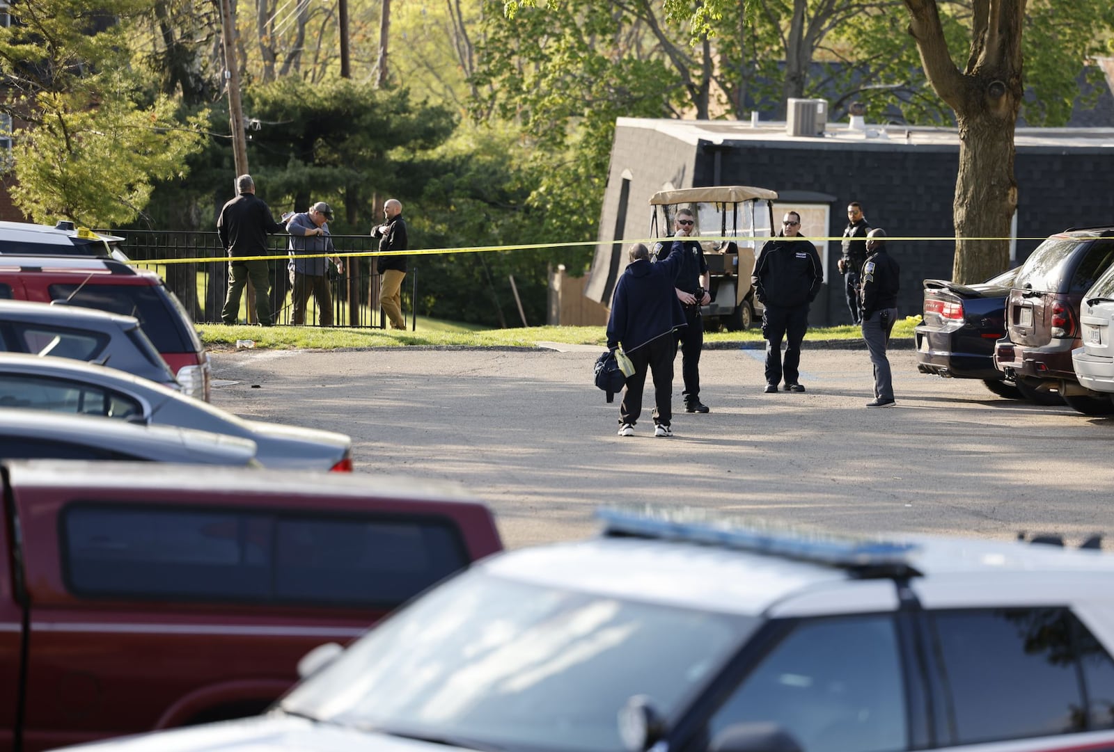 Investigators outside the Olde Towne apartments in Middletown after police said a standoff ended with exchanging gunfire with a suspect Monday afternoon | Nick Graham/Staff