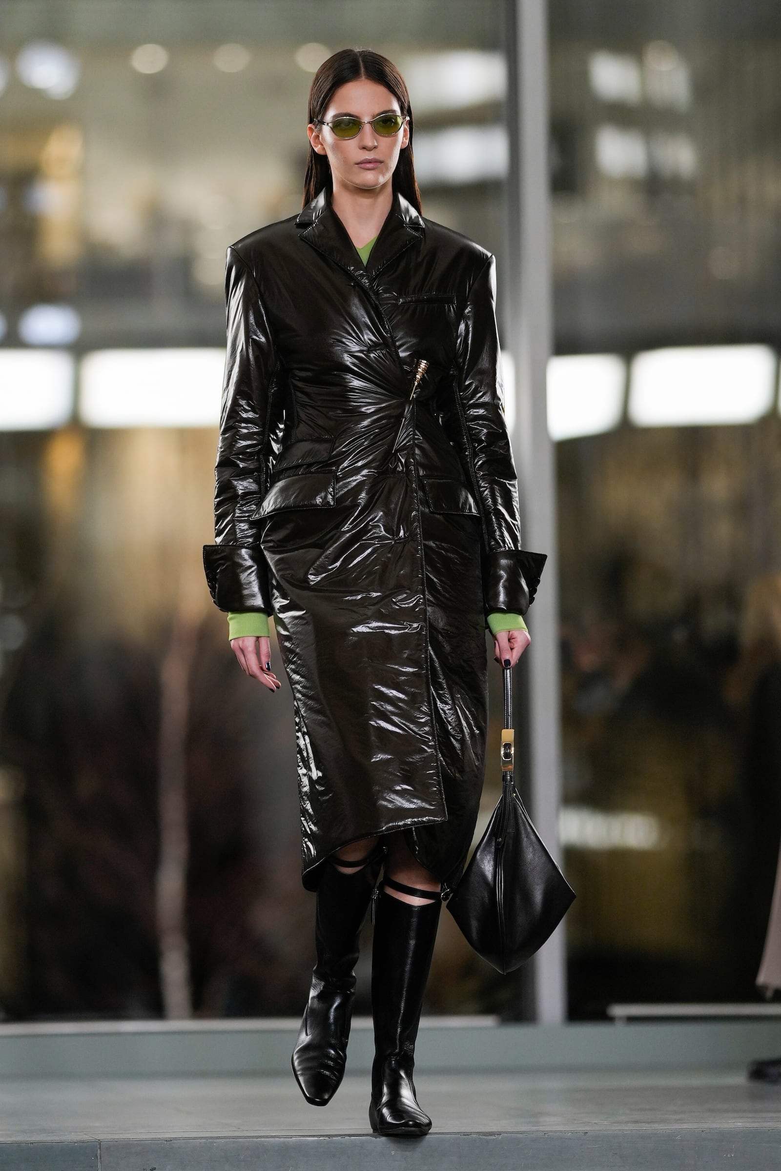 A model walks the runway during the Tory Burch Fall/Winter 2025 fashion show as part of New York Fashion Week on Monday, Feb. 10, 2025, at the Museum of Modern Art in New York. (Photo by Charles Sykes/Invision/AP)