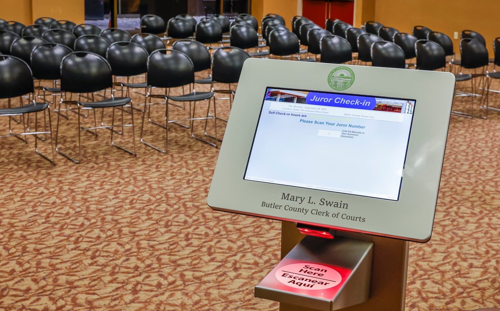 Butler County has a new system with postcards being sent out as a summons for jury service with links to online questionnaires. Potential jurors can scan a code to check in when they get to jury selection at one of the new kiosks at the courthouse. NICK GRAHAM/STAFF