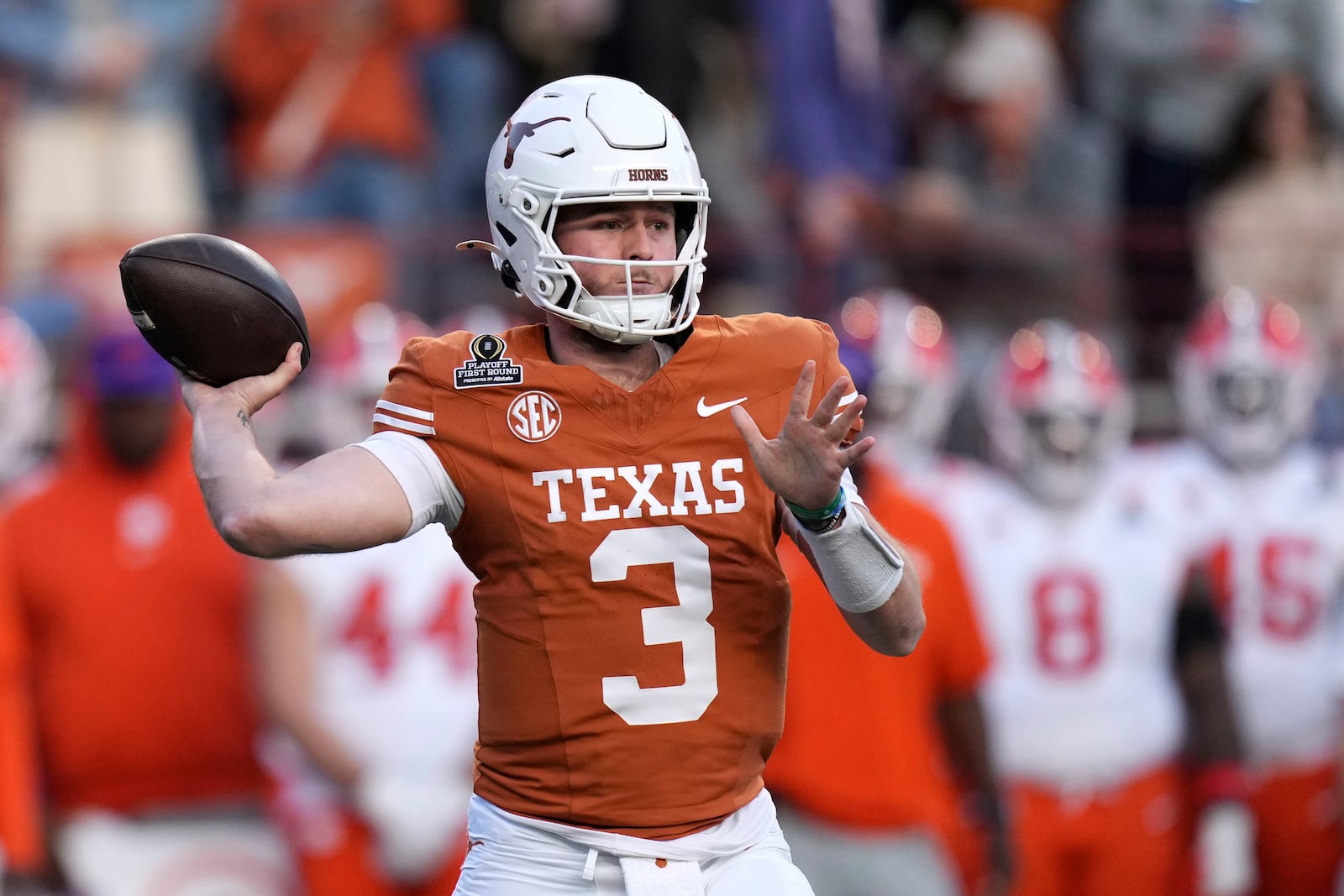 Texas quarterback Quinn Ewers throws a pass during the second half against Clemson in the first round of the College Football Playoff, Saturday, Dec. 21, 2024, in Austin, Texas. (AP Photo/Eric Gay)