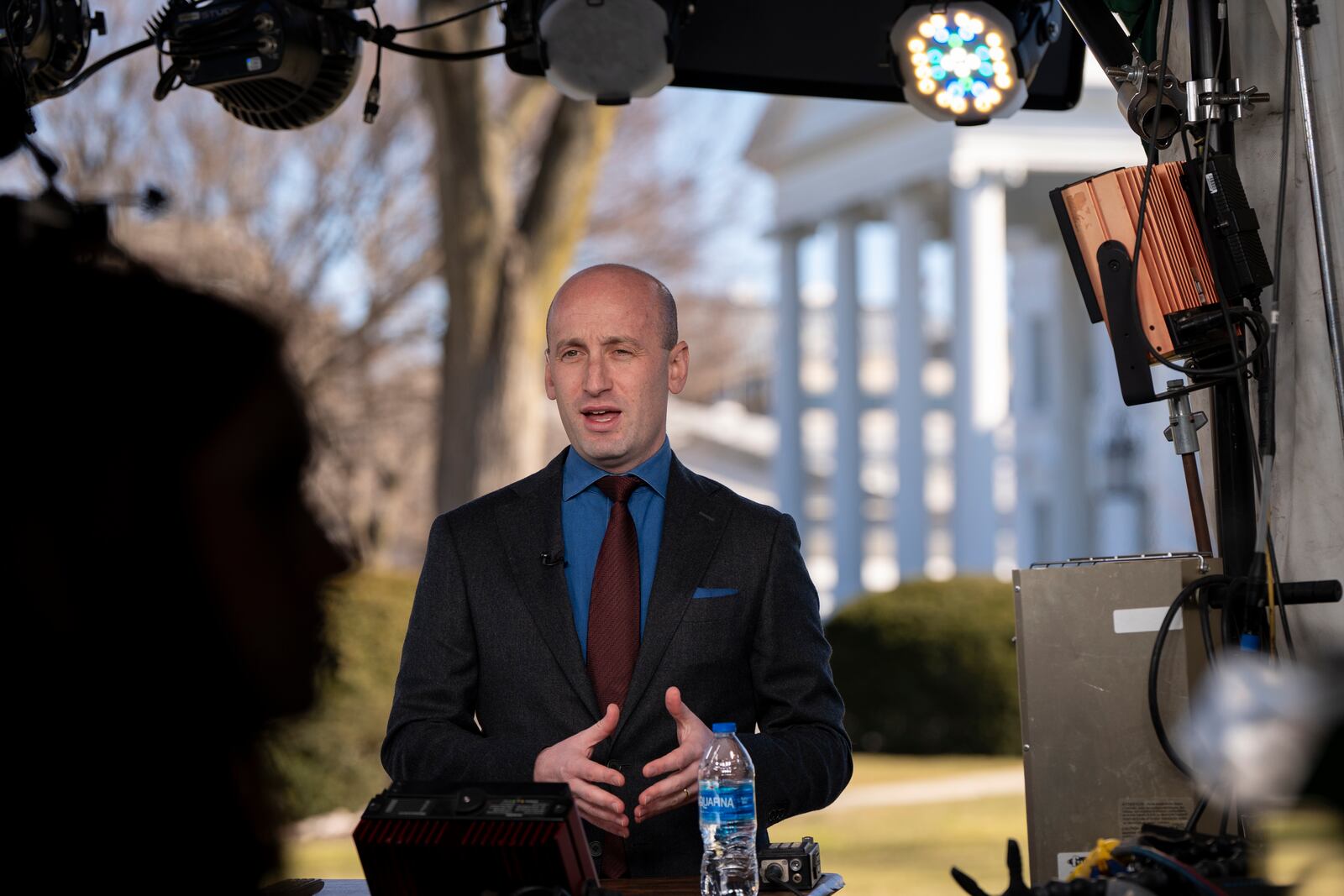 White House deputy chief of policy Stephen Miller does a live television interview at the White House, Monday, Feb. 17, 2025, in Washington. (AP Photo/Alex Brandon)