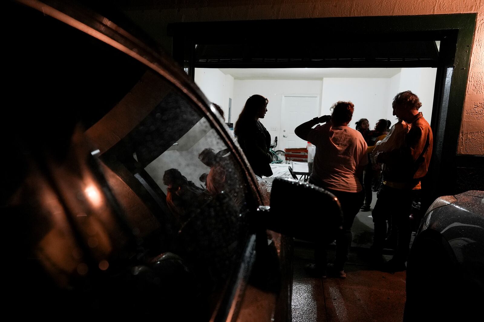 Nora Sandigo, center left, who runs a non-profit dedicated to supporting immigrant families, speaks with a group of mothers worried about the possibility of being deported, to educate them about their legal rights and options to proctect their families, Friday, Jan. 17, 2025, in Florida City, Fla. (AP Photo/Rebecca Blackwell)