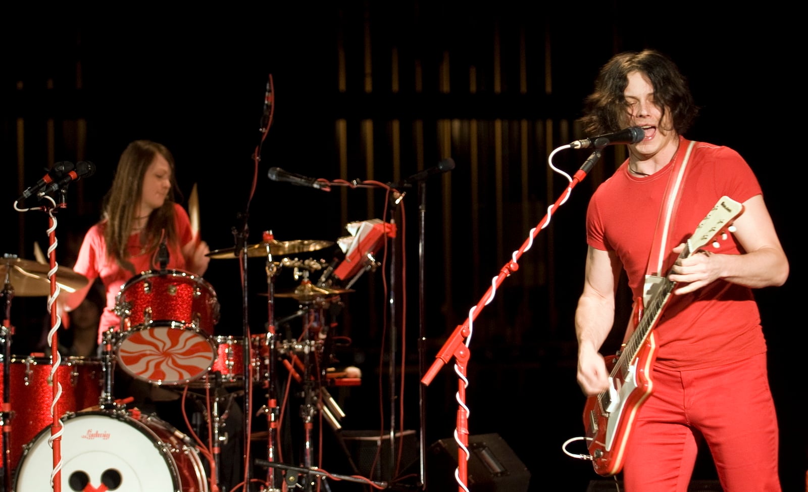 FILE - Musicians Jack White and Meg White of the rock band "The White Stripes" perform in Whitehorse, Yukon, Canada, on June 25, 2007. (Vince Fedoroff/The Canadian Press via AP, File)