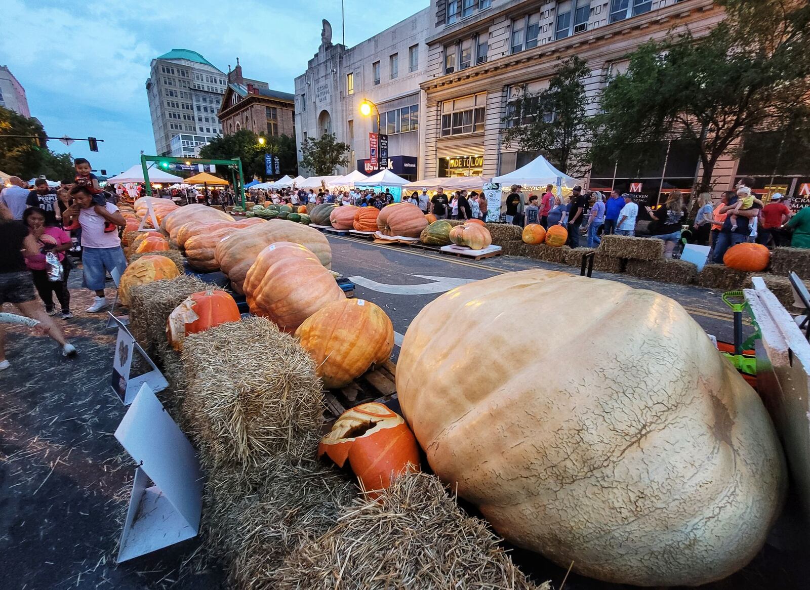 High Street was down and lined with vendors, food trucks, rides, games, pumpkins and more for visitors to enjoy Saturday at the 10th annual Operation Pumpkin in downtown Hamilton. NICK GRAHAM / STAFF