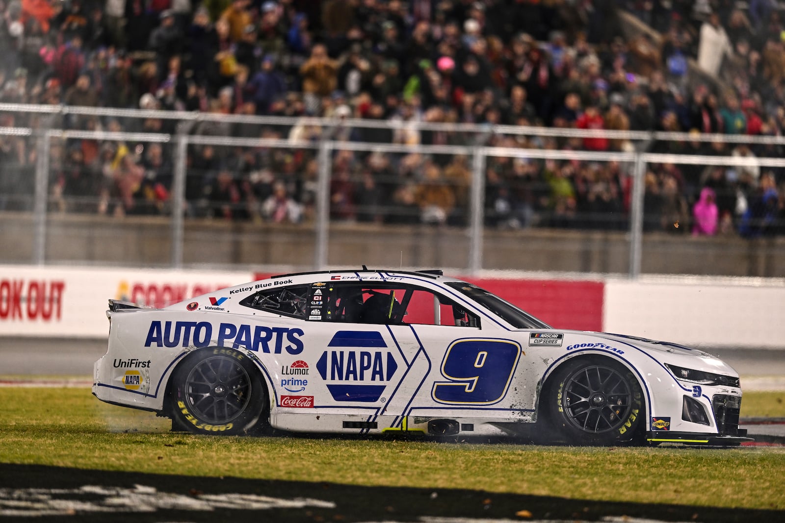 Chase Elliott does a burnout after winning a NASCAR Cup Series auto race at Bowman Gray Stadium, Sunday, Feb. 2, 2025, in Winston-Salem, N.C. (AP Photo/Matt Kelley)