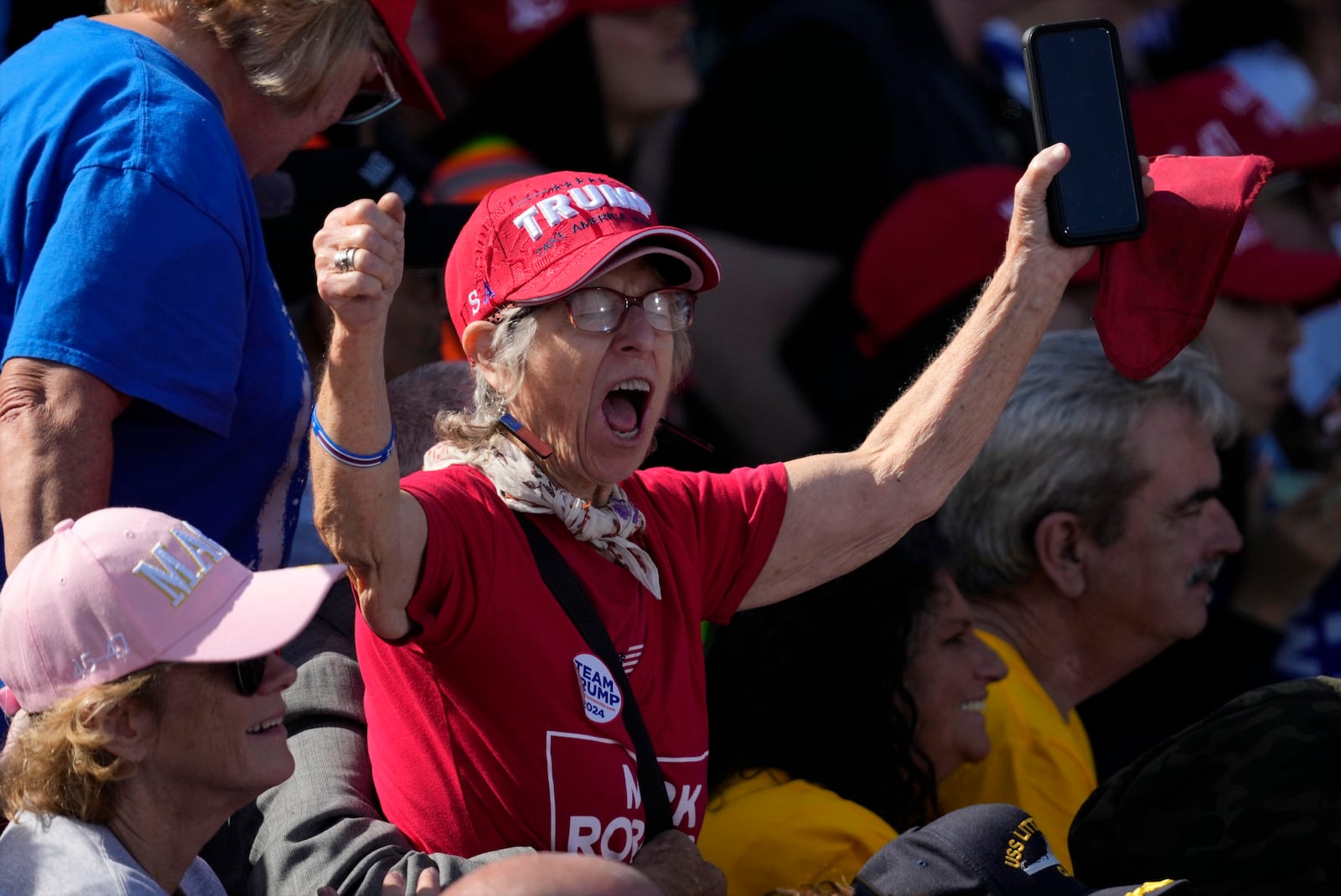 A supporter cheers as Republican presidential nominee former President Donald Trump speaks at a campaign rally in Gastonia, N.C., Saturday, Nov. 2, 2024. (AP Photo/Chris Carlson)