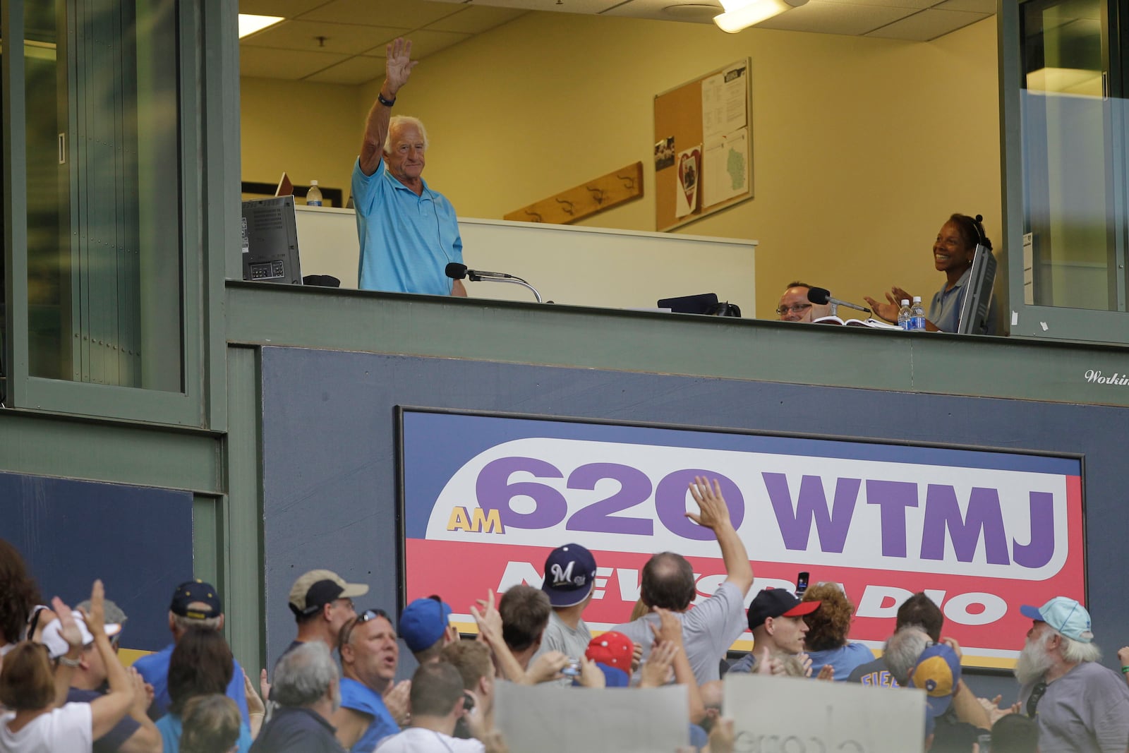 FILE - Milwaukee Brewers radio broadcaster Bob Uecker acknowledges the crowd during the second inning of a baseball game against the Washington Nationals Friday, July 23, 2010, in Milwaukee. (AP Photo/Morry Gash, File)