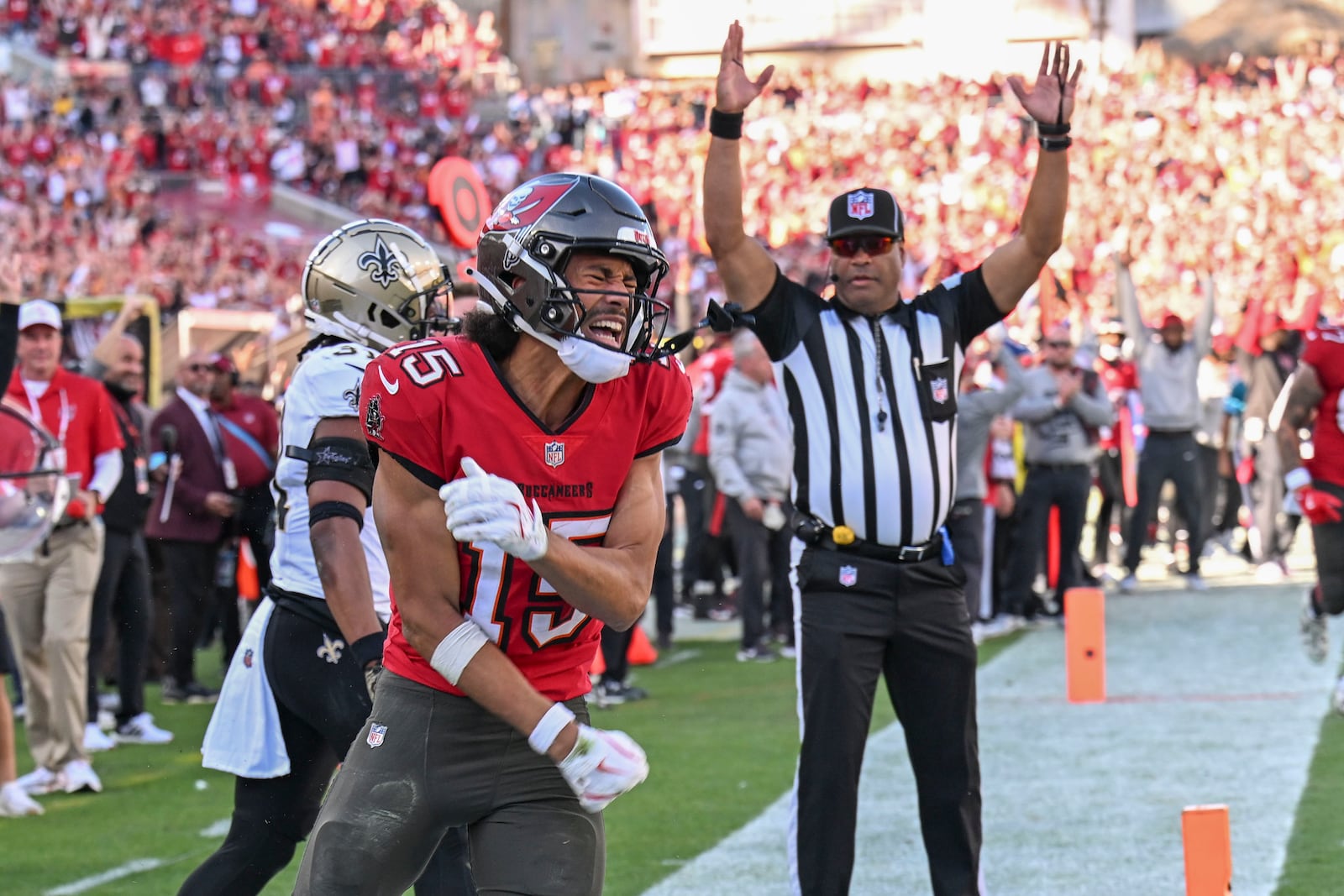 Tampa Bay Buccaneers wide receiver Jalen McMillan (15) reacts to his touchdown reception during the second half of an NFL football game against the New Orleans Saints Sunday, Jan. 5, 2025, in Tampa, Fla. (AP Photo/Jason Behnken)