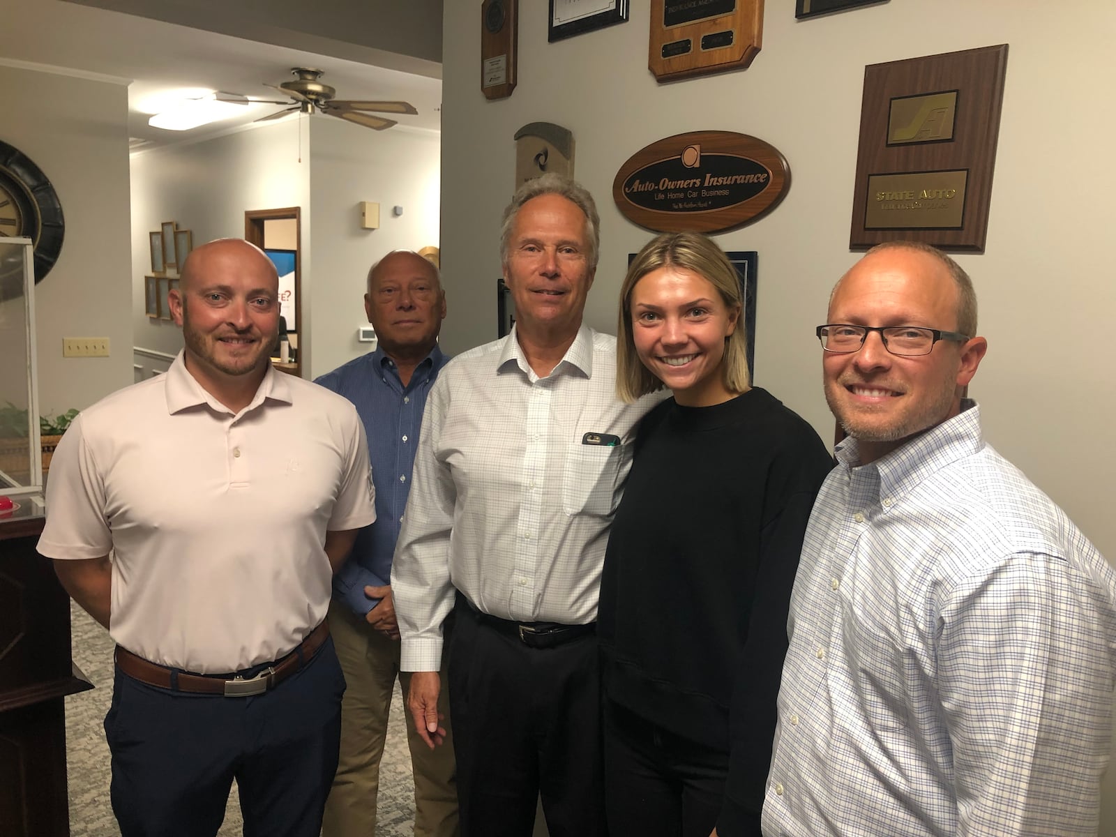 Moon & Adrion Insurance Agency in Middletown is celebrating 100 years in business. From left: Kyle Kilburn, Craig Moon, Bryan Canter, Katy-Canter-Davis and Tal Moon. RICK McCRABB/STAFF