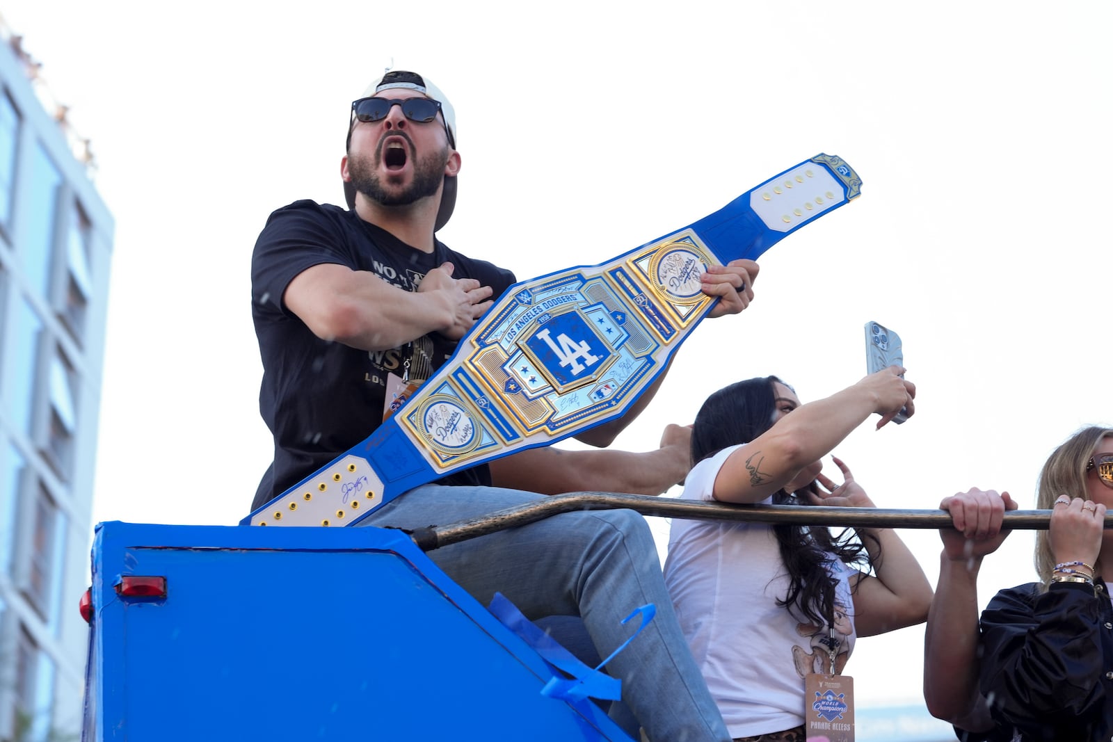 Los Angeles Dodgers' Alex Vesia yells in celebration during the Los Angeles Dodgers baseball World Series championship parade Friday, Nov. 1, 2024, in Los Angeles. (AP Photo/Jae C. Hong)