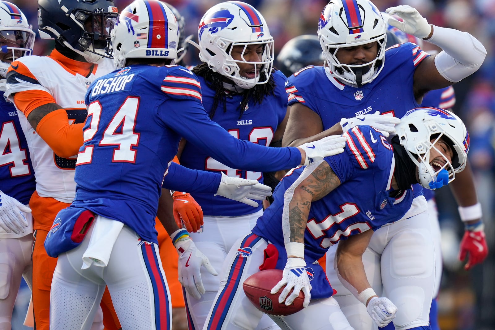 Buffalo Bills wide receiver Khalil Shakir (10) reacts after a punt return against the Denver Broncos during the third quarter of an NFL wild card playoff football game, Sunday, Jan. 12, 2025, in Orchard Park, N.Y. (AP Photo/Seth Wenig)