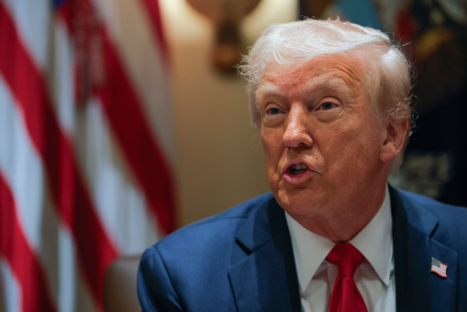 FILE - President Donald Trump speaks during a Cabinet meeting at the White House in Washington, Tuesday, Feb. 26, 2025. (Pool via AP, file)