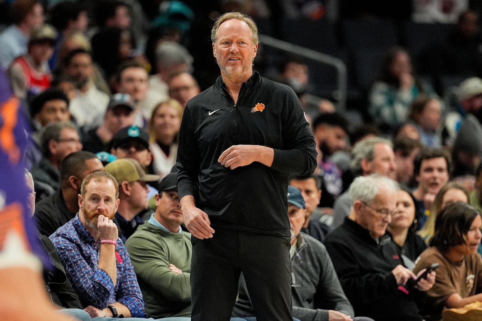 Phoenix Suns head coach Mike Budenholzer during the first half of an NBA basketball game against the Charlotte Hornets in Charlotte, N.C., Tuesday, Jan. 7, 2025. (AP Photo/Jim Dedmon)