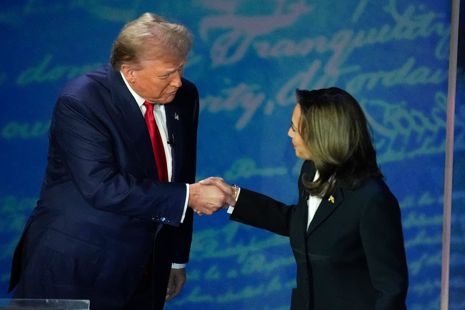 FILE - Republican presidential nominee former President Donald Trump, left, and Democratic presidential nominee Vice President Kamala Harris shake hands before the start of an ABC News presidential debate, Sept. 10, 2024, in Philadelphia. (AP Photo/Alex Brandon, File)