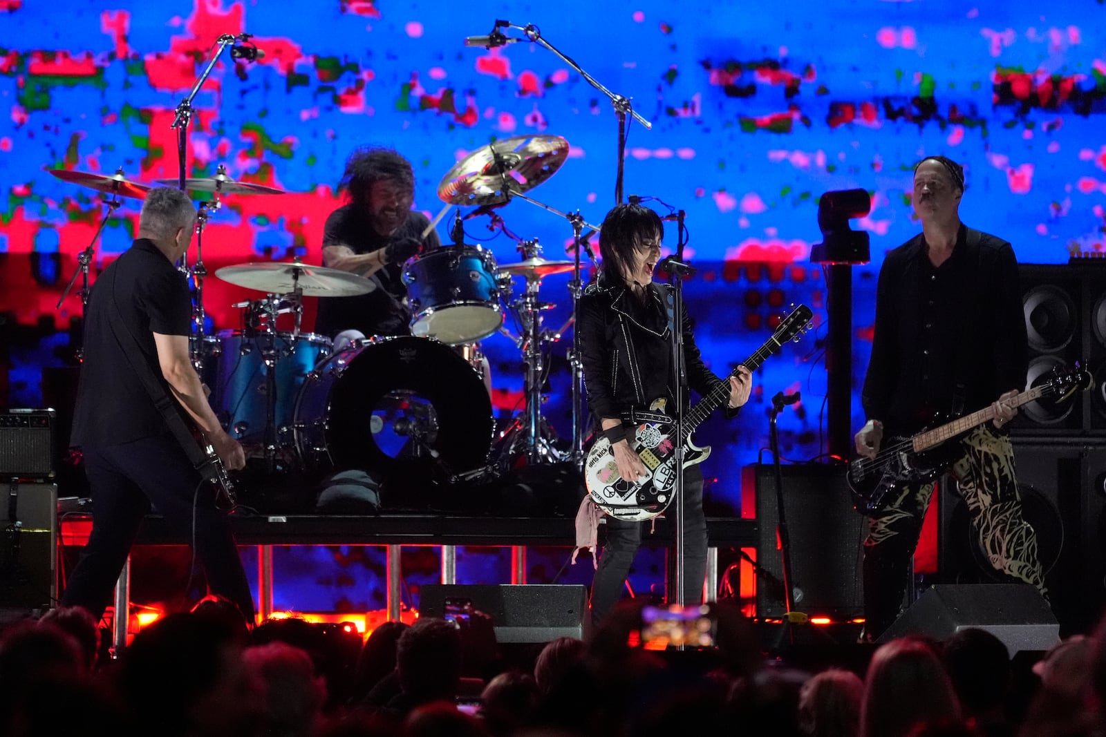 Joan Jett, second from right, performs with Pat Smear, from left, Dave Grohl, and Krist Novoselic of Nirvana during the FireAid benefit concert on Thursday, Jan. 30, 2025, at The Forum in Inglewood, Calif. (AP Photo/Chris Pizzello)