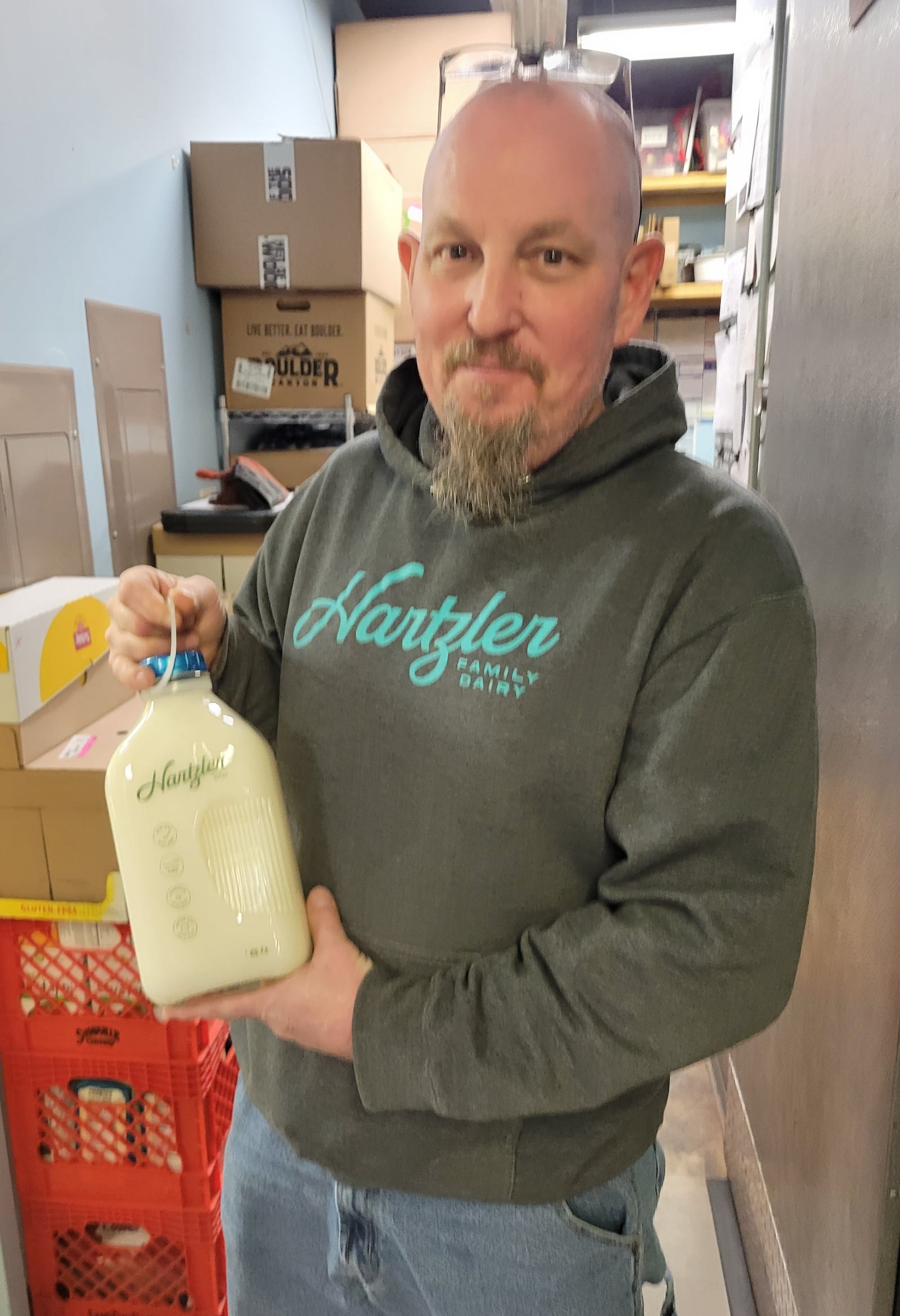 A Hartzler employer delivers the milk to MOON Co-Op in Oxford. CONTRIBUTED