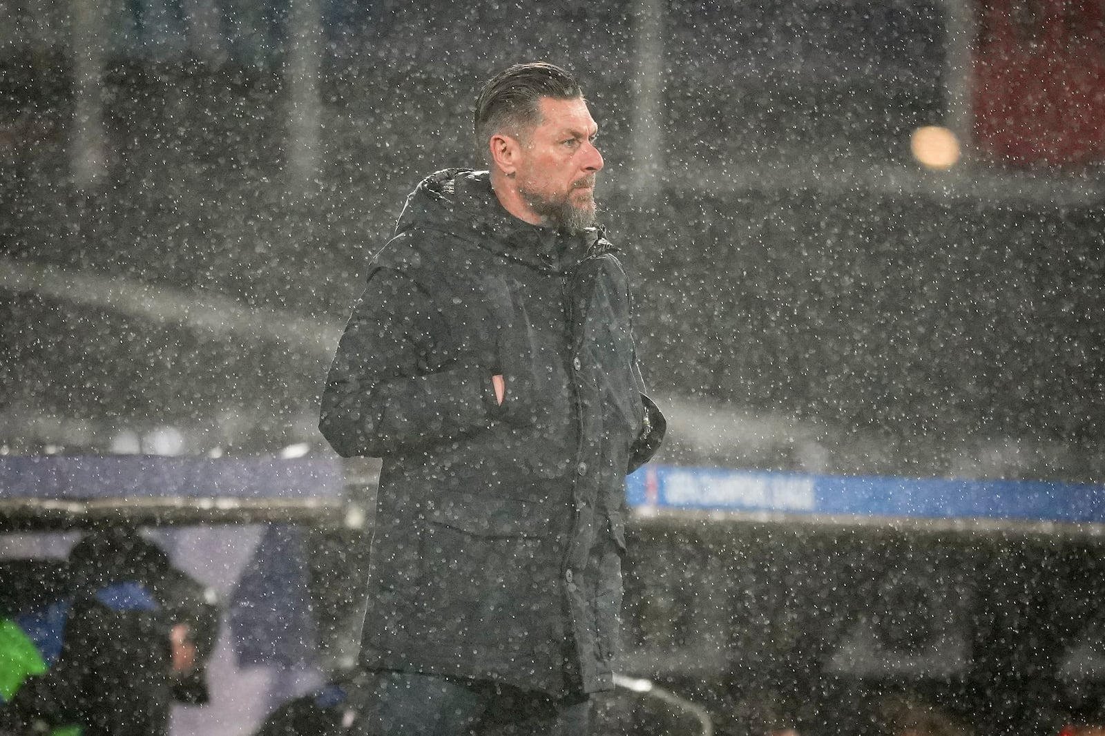 Feyenoord's interim coach Pascal Bosschaart stands during the Champions League playoff first leg soccer match between Feyenoord and AC Milan, at the De Kuip stadium, in Rotterdam, Netherlands, Wednesday, Feb. 12, 2025. (AP Photo/Peter Dejong)