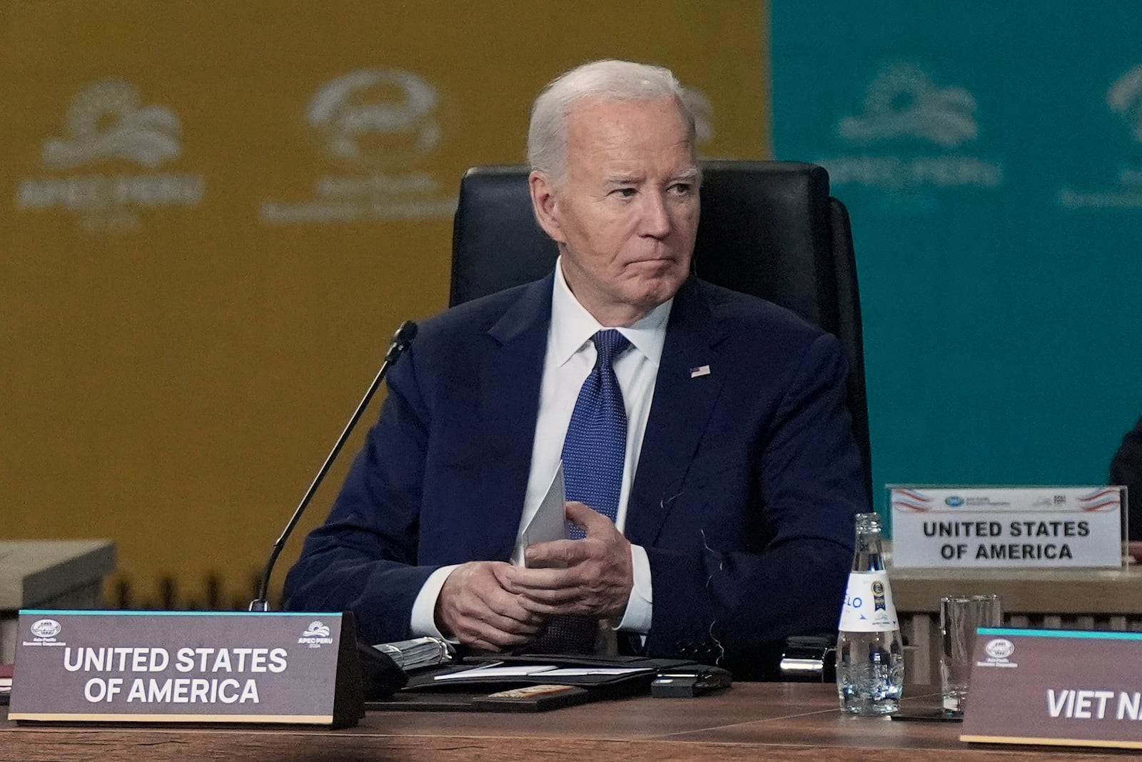 President Joe Biden listens during the APEC Leaders' Informal Dialogue at the APEC Summit in Lima, Peru, Friday, Nov. 15, 2024. (AP Photo/Manuel Balce Ceneta)