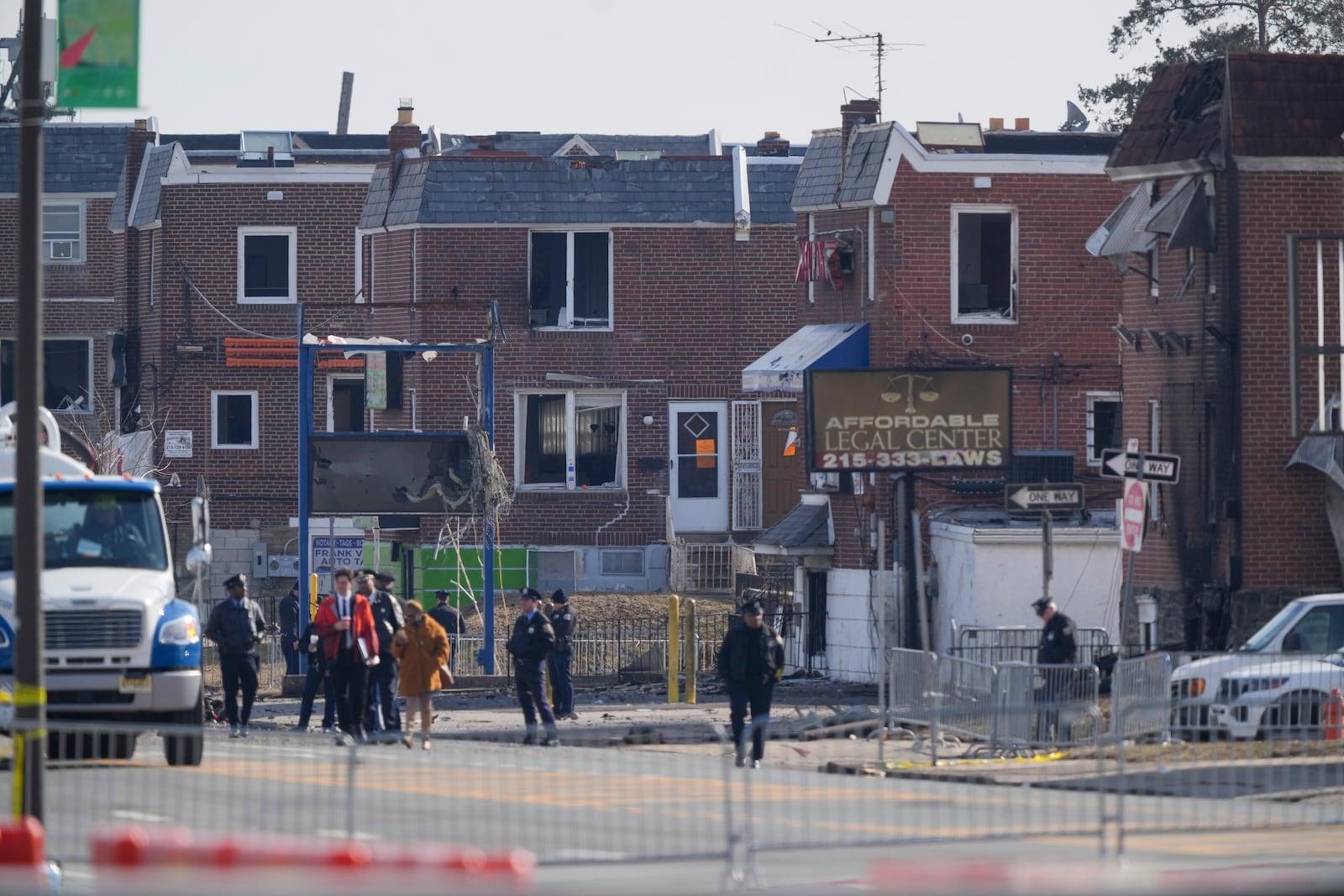 Shown are damaged structures in the aftermath of a fatal small plane crashed in Philadelphia, Monday, Feb. 3, 2025. (AP Photo/Matt Rourke)