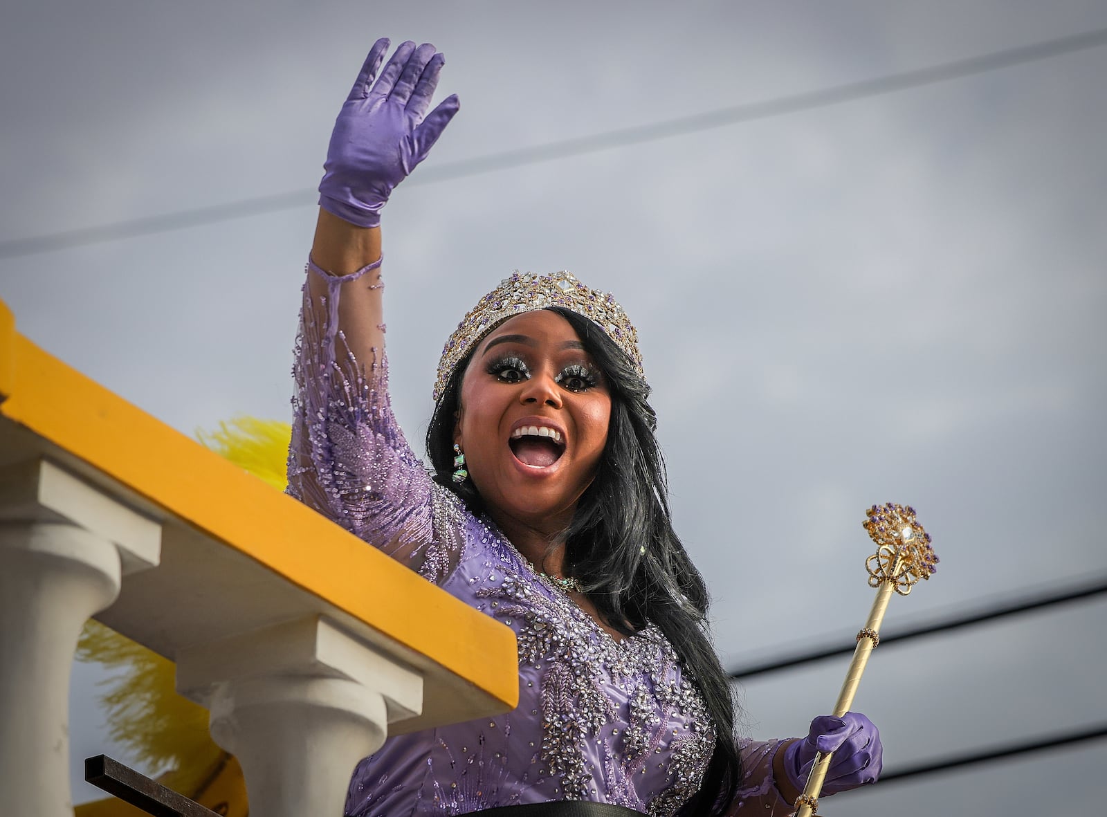 Queen Zulu 2025 Kristen Bonds Mason greets the crowd as the Zulu parade rolls along Jackson Avenue in New Orleans on Mardi Gras Day, Tuesday, March 4, 2025. (Brett Duke/The Advocate via AP)