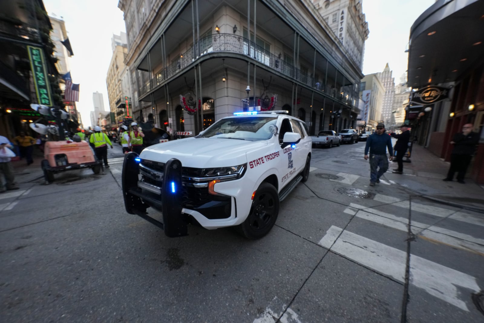 A Louisiana State Police car positions on Bourbon Street ahead of the Super Bowl in New Orleans, Friday, Jan. 31, 2025. (AP Photo/Gerald Herbert)