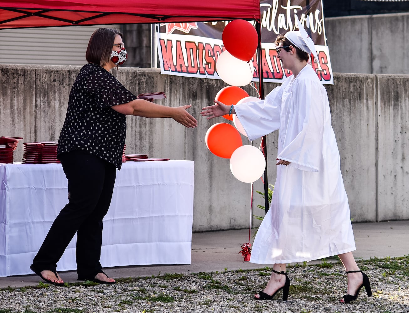 Madison High School drive-thru graduation ceremony at Land of Illusion