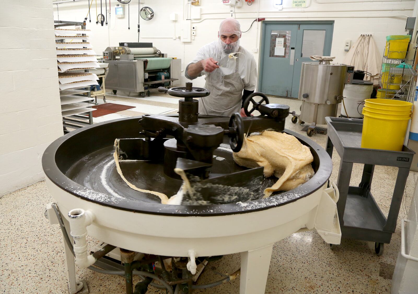 At the Esther Price Fine Chocolates factory on Wayne Avenue in Dayton the employees still use the cream beaters that Esther Price purchased more than 40 years ago. LISA POWELL / STAFF