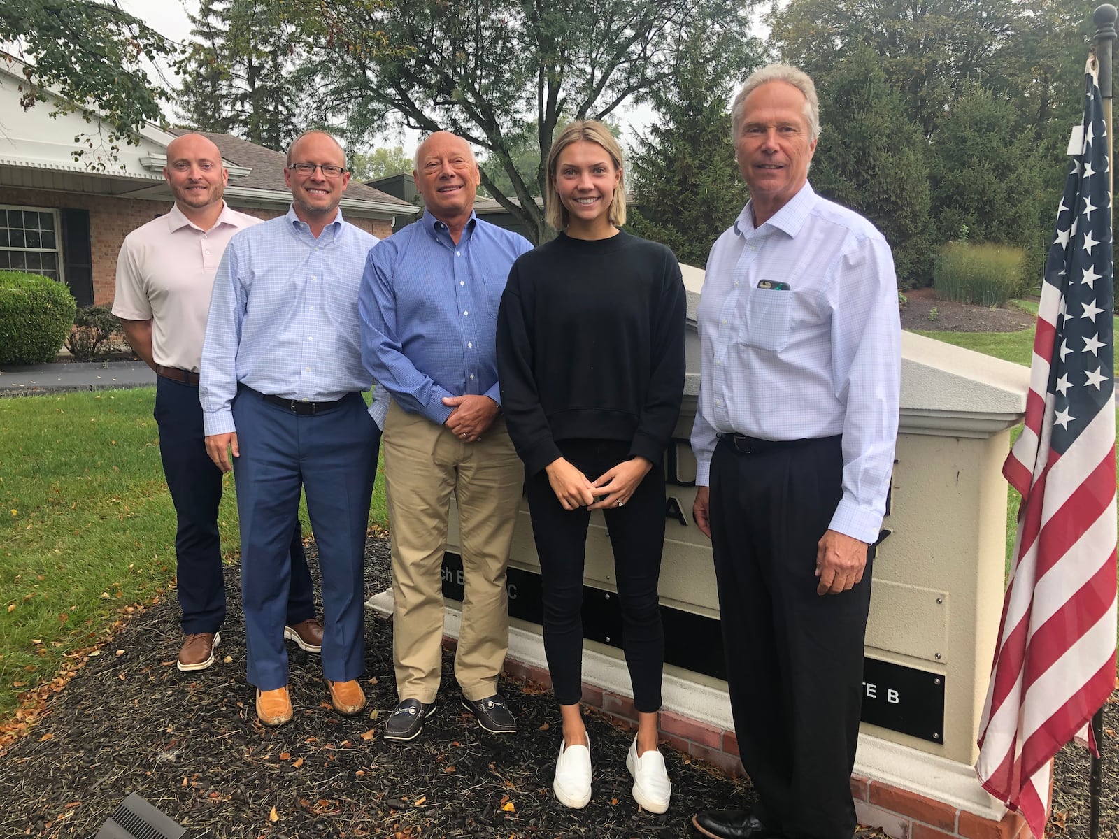 Moon & Adrion Insurance Agency in Middletown is celebrating 100 years in business. From left: Kyle Kilburn, Tal Moon, Craig Moon, Katy-Canter-Davis and Bryan Canter. RICK McCRABB/STAFF