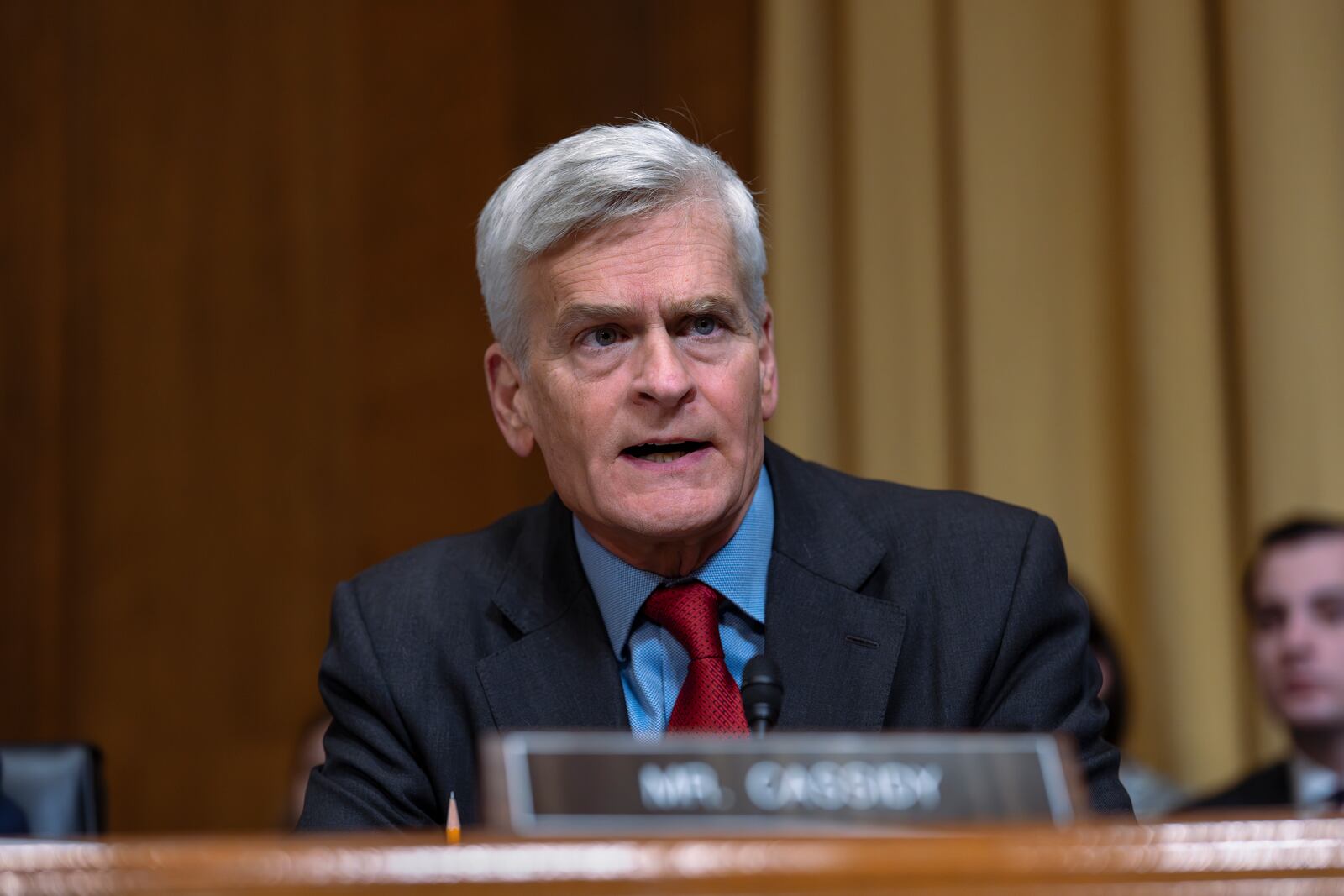 Sen. Bill Cassidy, R-La., votes aye at the final moment as the Senate Finance Committee holds a roll call vote to approve the nomination of Robert F. Kennedy Jr. to lead the Health and Human Services Department, at the Capitol in Washington, Tuesday, Feb. 4, 2025. (AP Photo/J. Scott Applewhite)