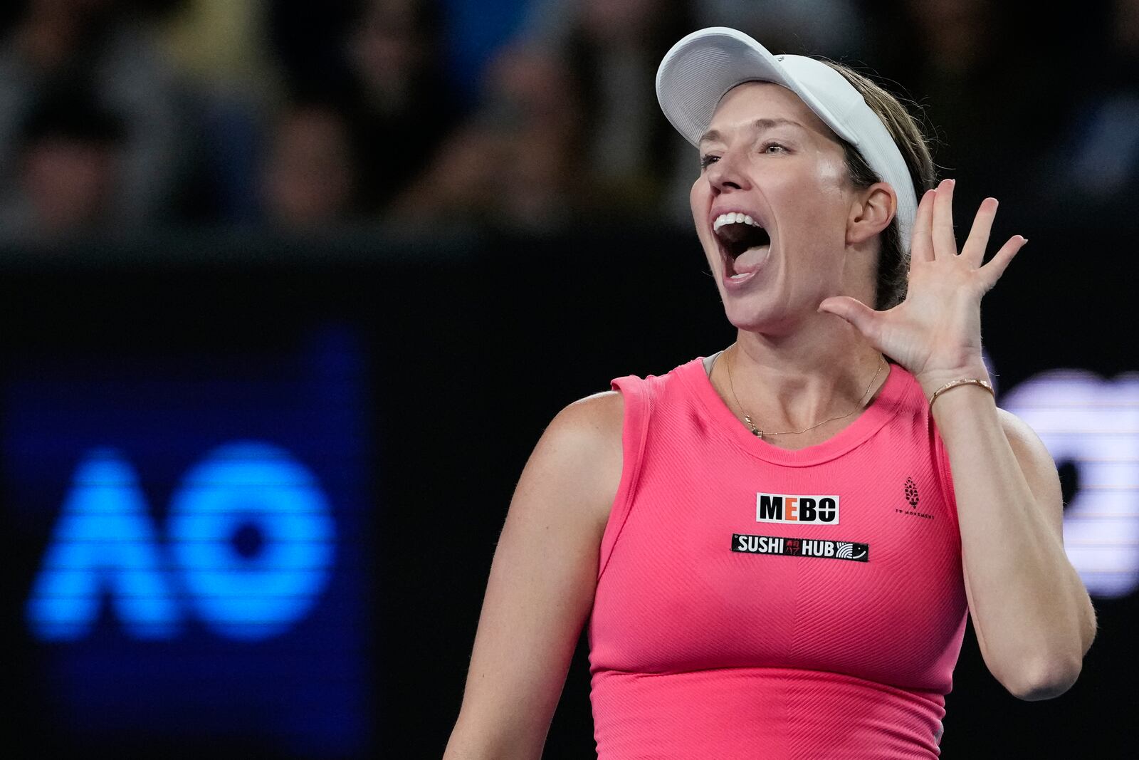 Danielle Collins of the U.S. reacts after defeating Destanee Aiava of Australia in their second round match at the Australian Open tennis championship in Melbourne, Australia, Thursday, Jan. 16, 2025. (AP Photo/Manish Swarup)