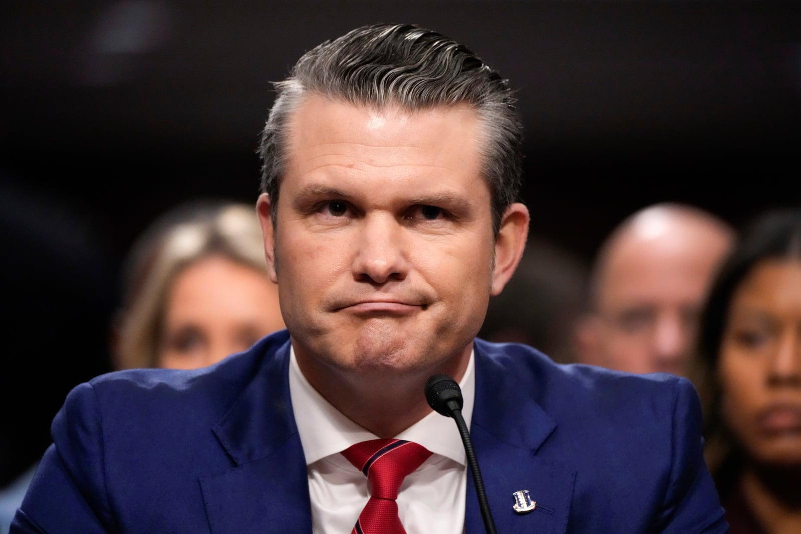 Pete Hegseth, President-elect Donald Trump's choice to be Defense secretary, appears before the Senate Armed Services Committee for his confirmation hearing, at the Capitol in Washington, Tuesday, Jan. 14, 2025. (AP Photo/Alex Brandon)