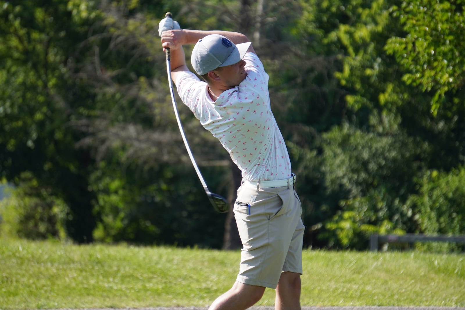 Jacob Brownley follows through on a tee shot during the final round of the Hamilton City Golf Championship on Sunday at Potter's Park Golf Course. Chris Vogt/CONTRIBUTED
