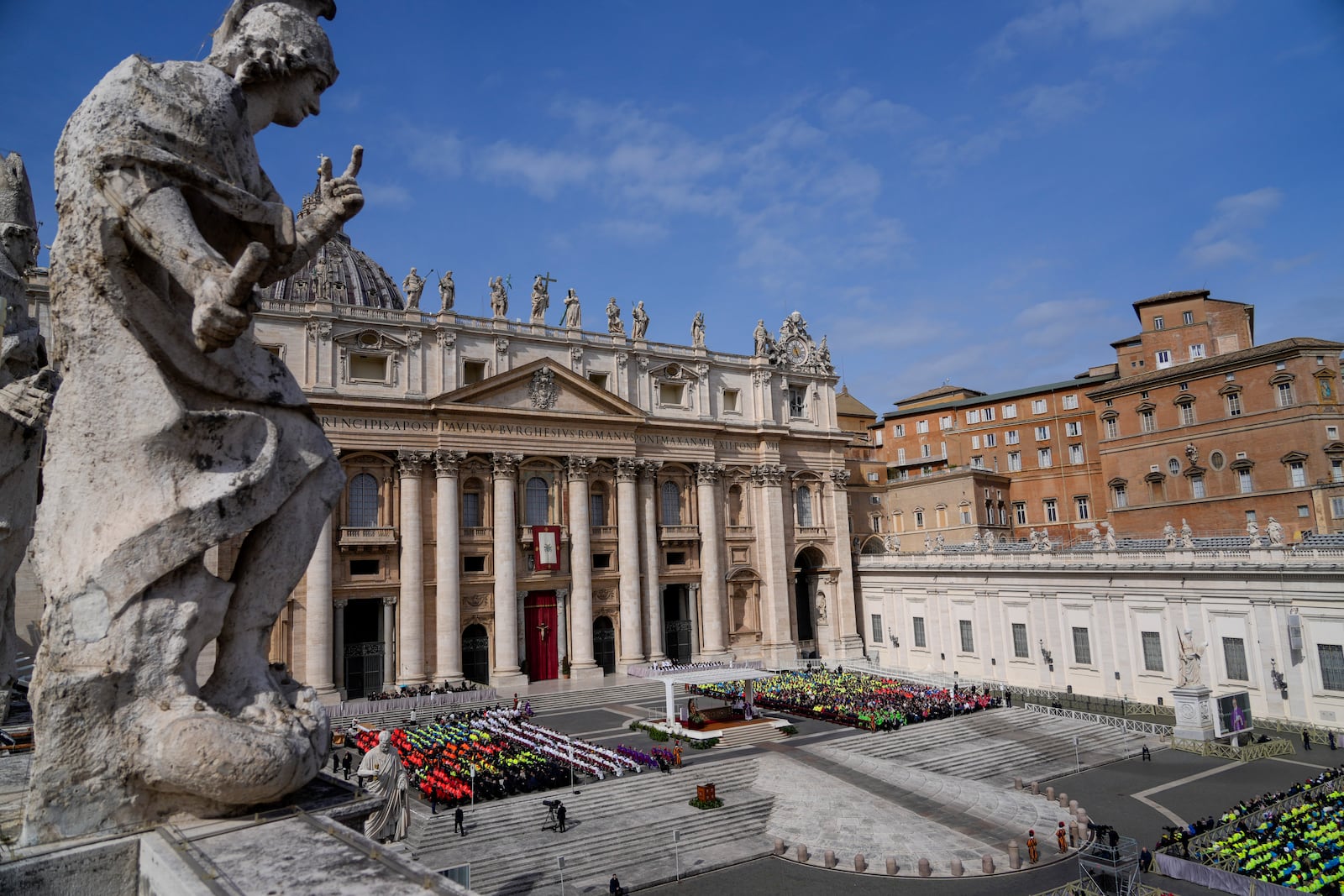 Cardinal Michael Czerny, prefect of the Dicastery for Promoting Integral Human Development, and delegate of Pope Francis celebrates a mass for the members of the world of volunteers in St. Peter's Square at The Vatican, Sunday, March 9, 2025. (AP Photo/Gregorio Borgia)